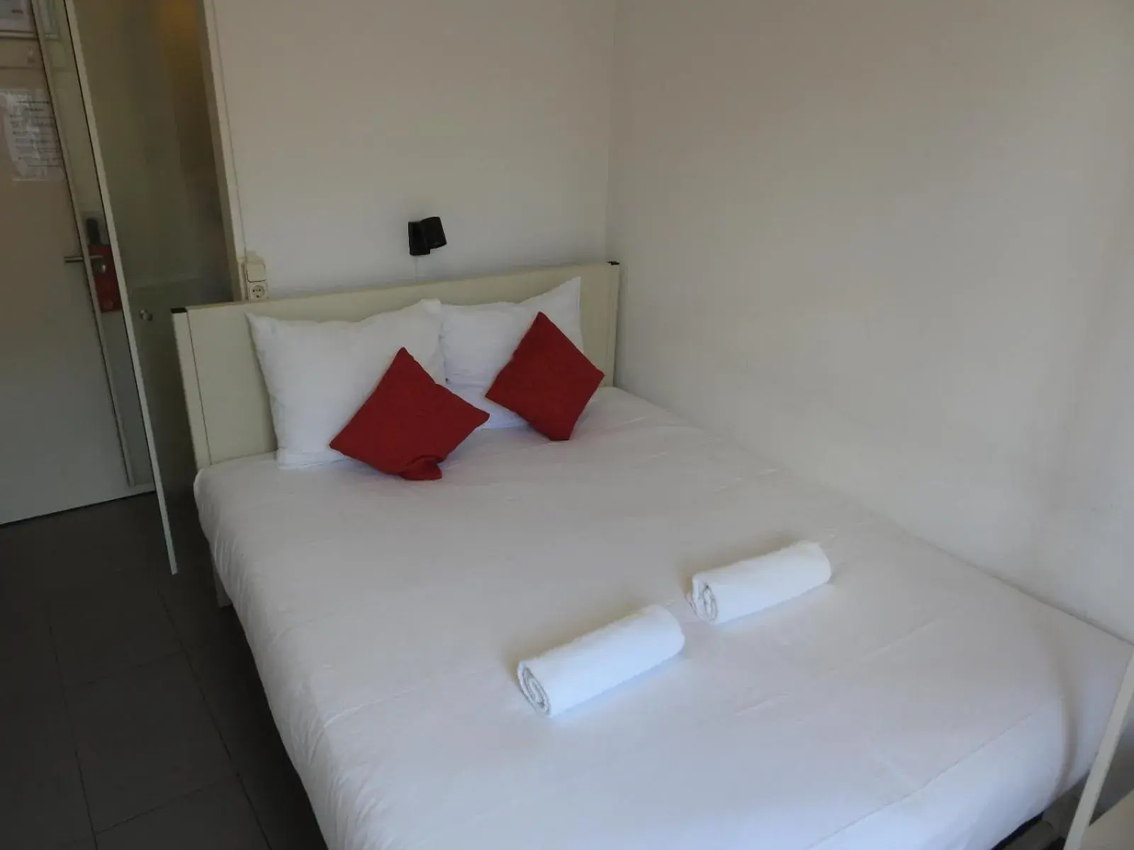 Bed in CS Hotel Bed in CS Hotel