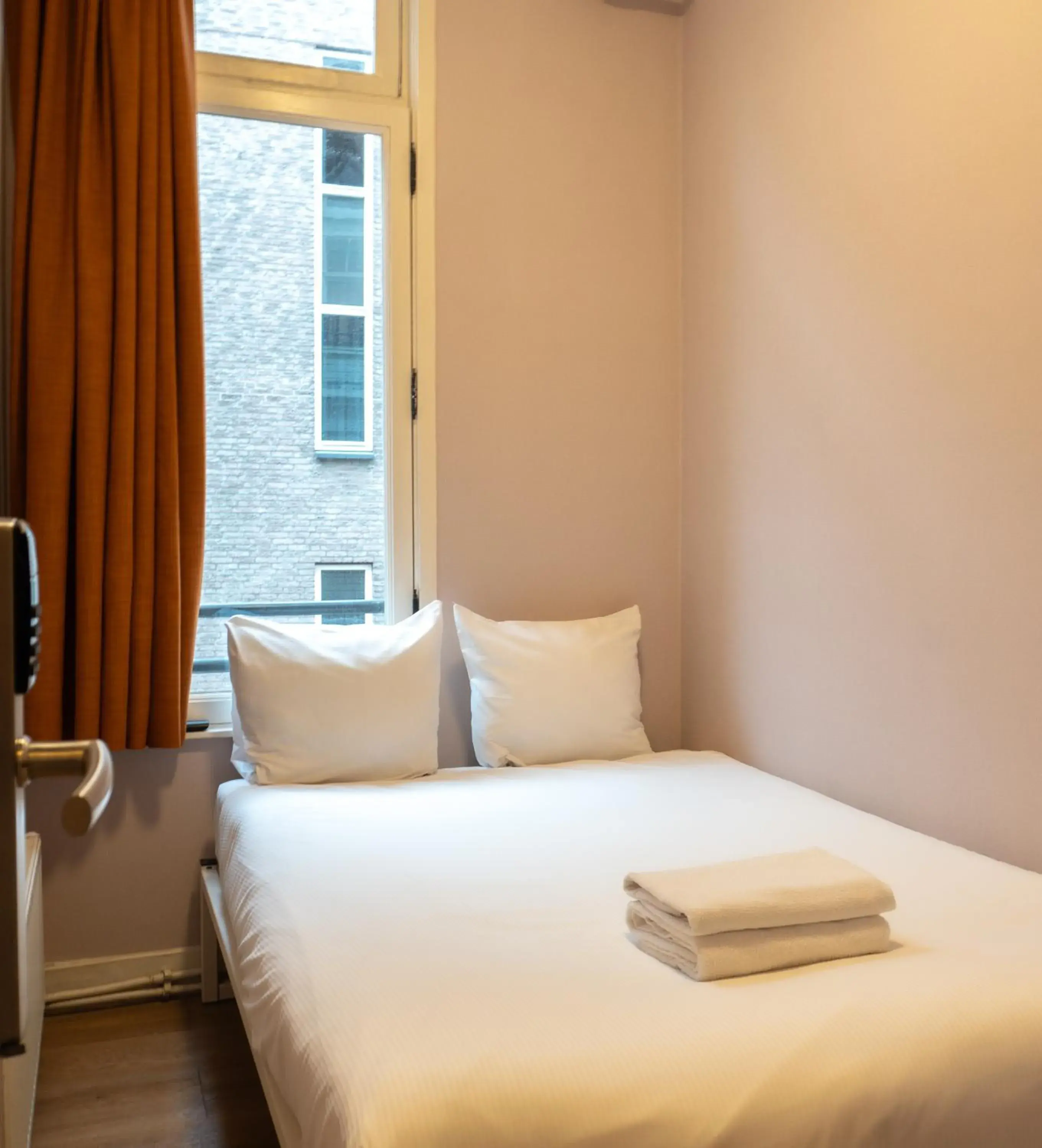 Bed in CS Hotel Bed in CS Hotel