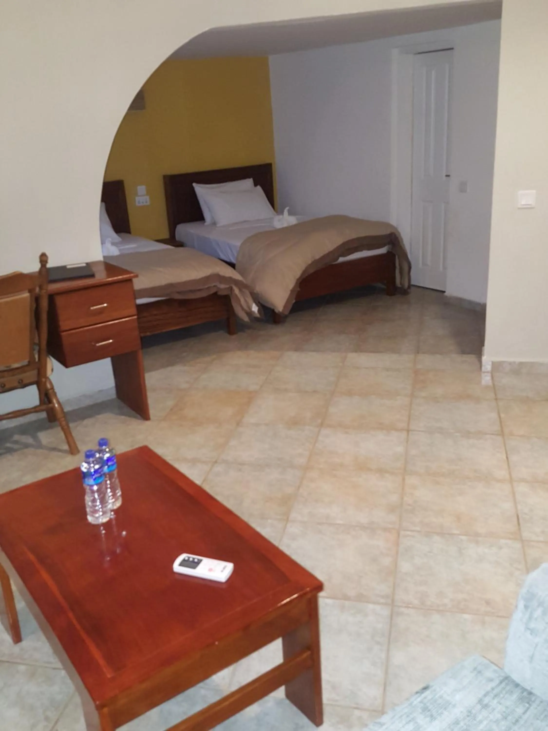 Bed in Tropic Garden Hotel