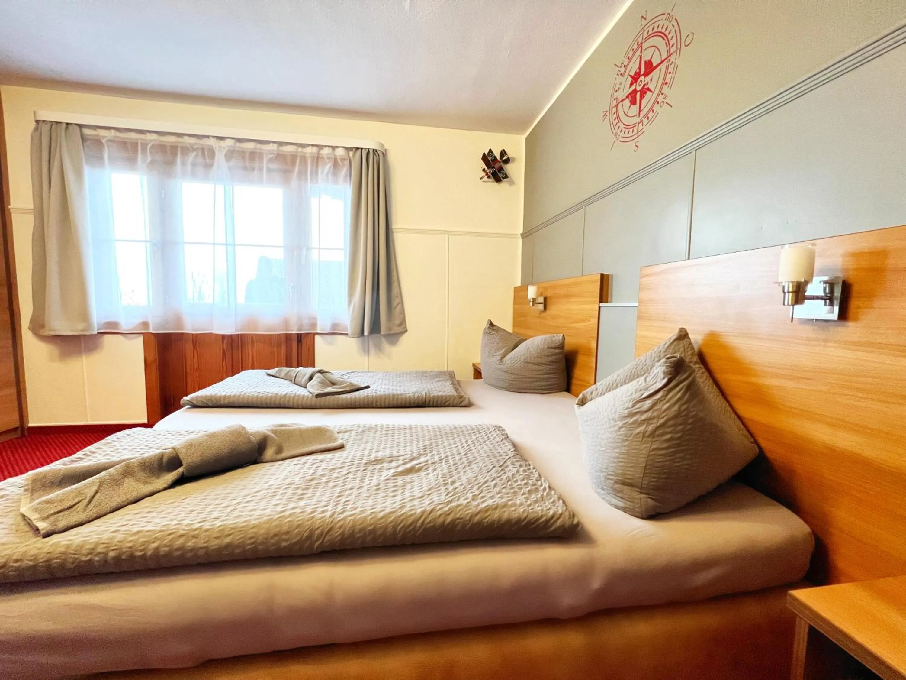 Photo of the whole room, Bed in BnB Fliegerhaeusle Hagnau 24h Self Check In