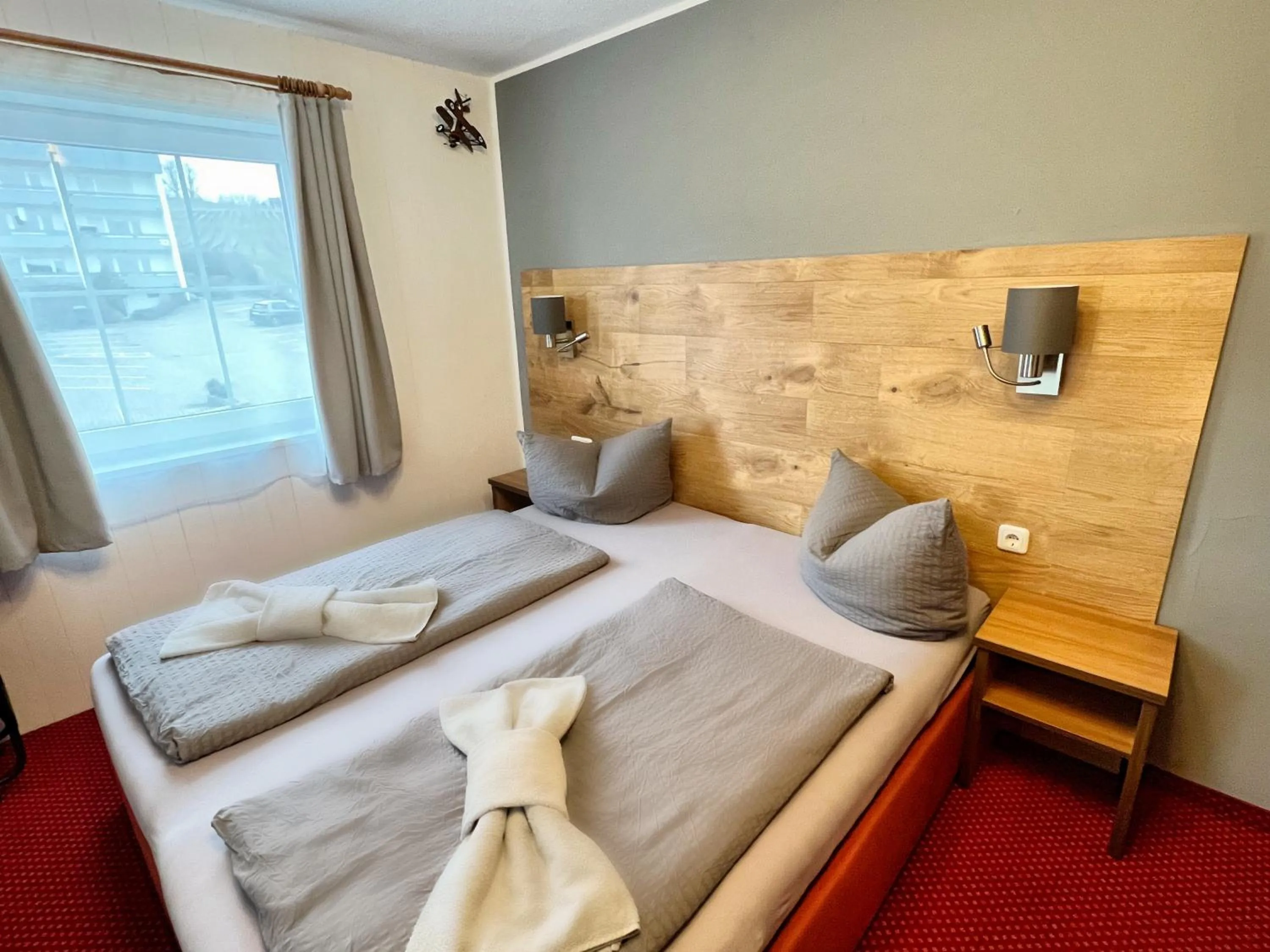 Photo of the whole room, Bed in BnB Fliegerhaeusle Hagnau 24h Self Check In