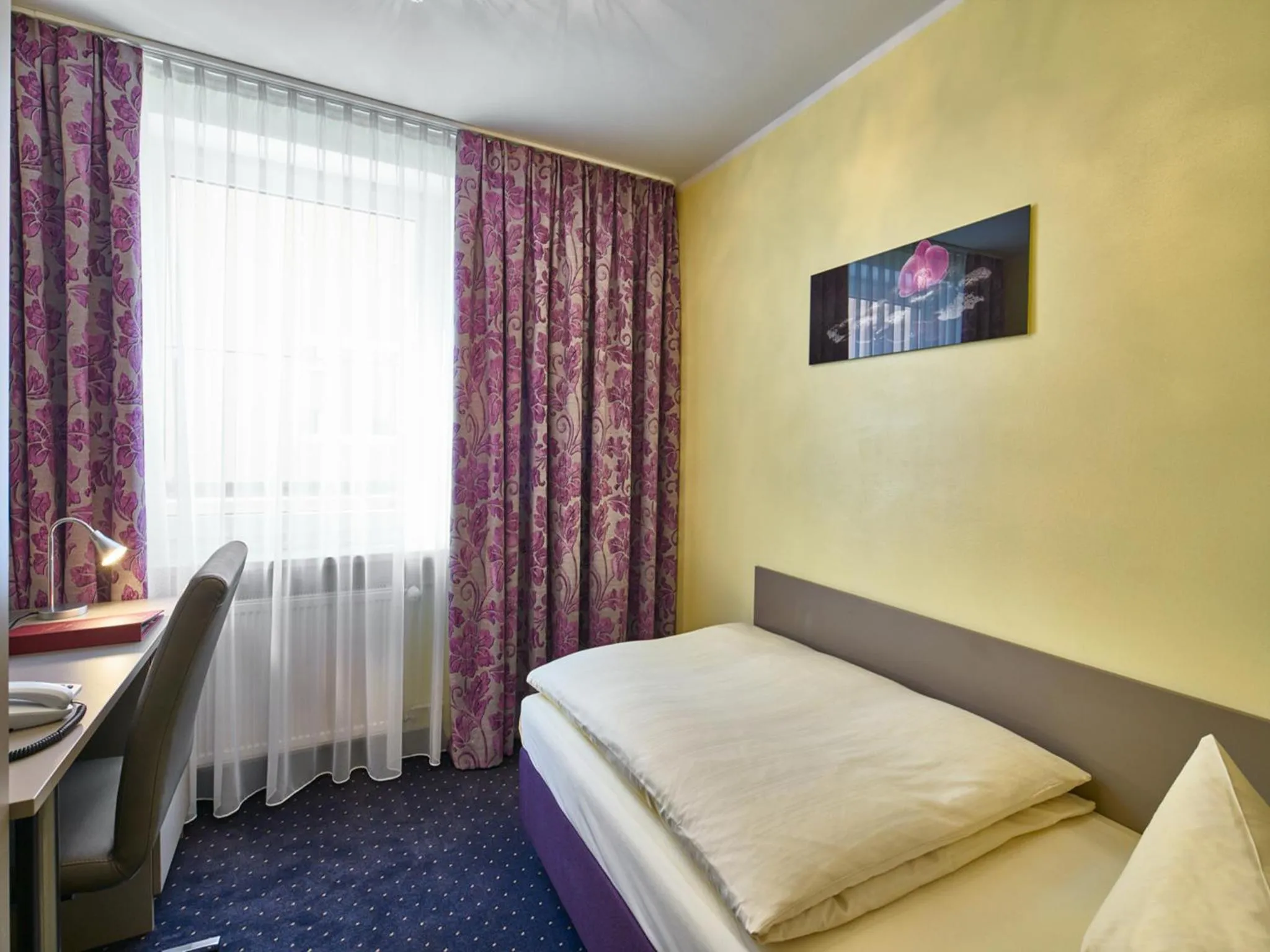 Bed in Hotel Alfa Zentrum