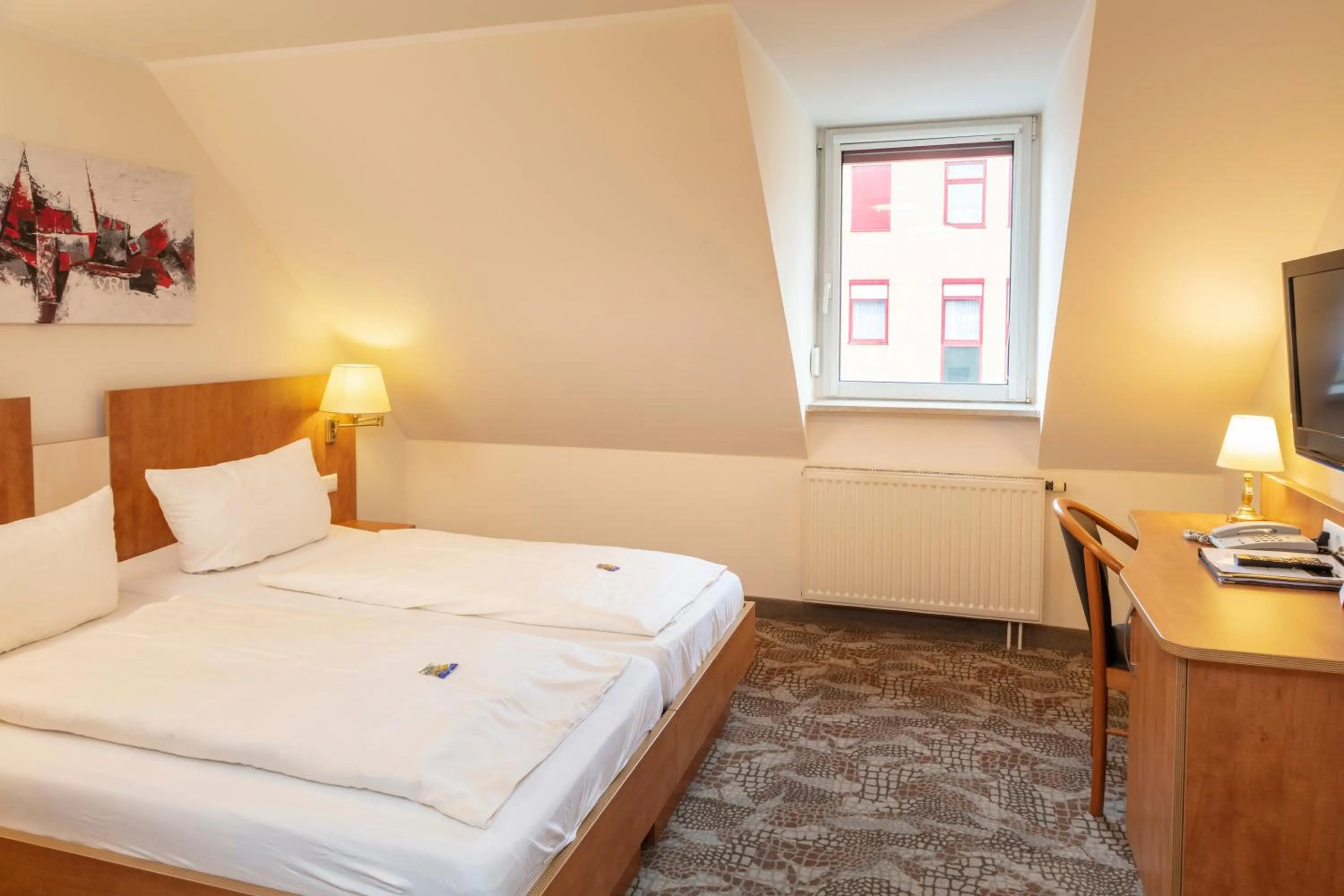 Photo of the whole room, Bed in Maximilian Hotel & Apartments Weil am Rhein / Basel
