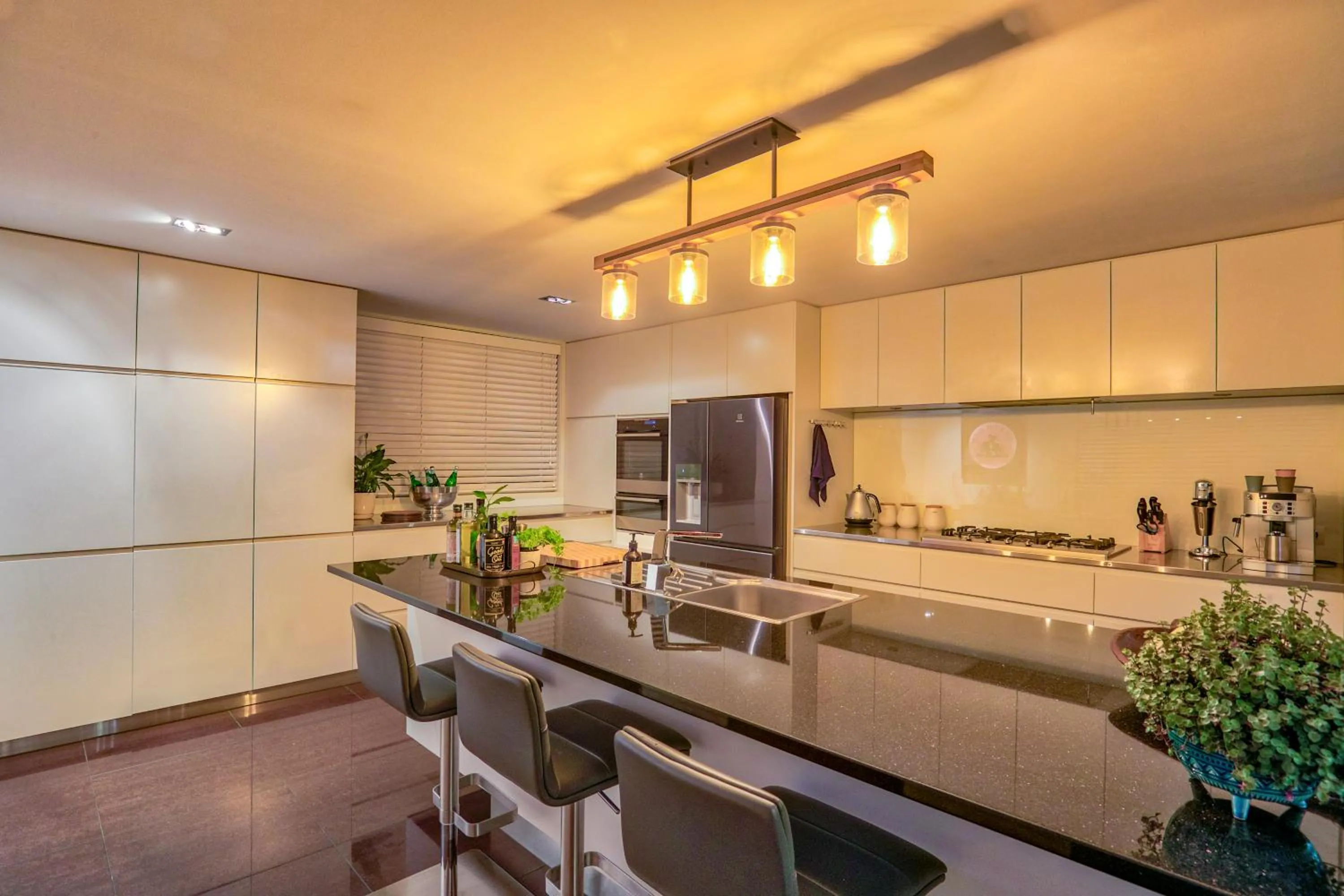 Kitchen or kitchenette in Waters Edge by Sotheby's Luxury Rental Homes