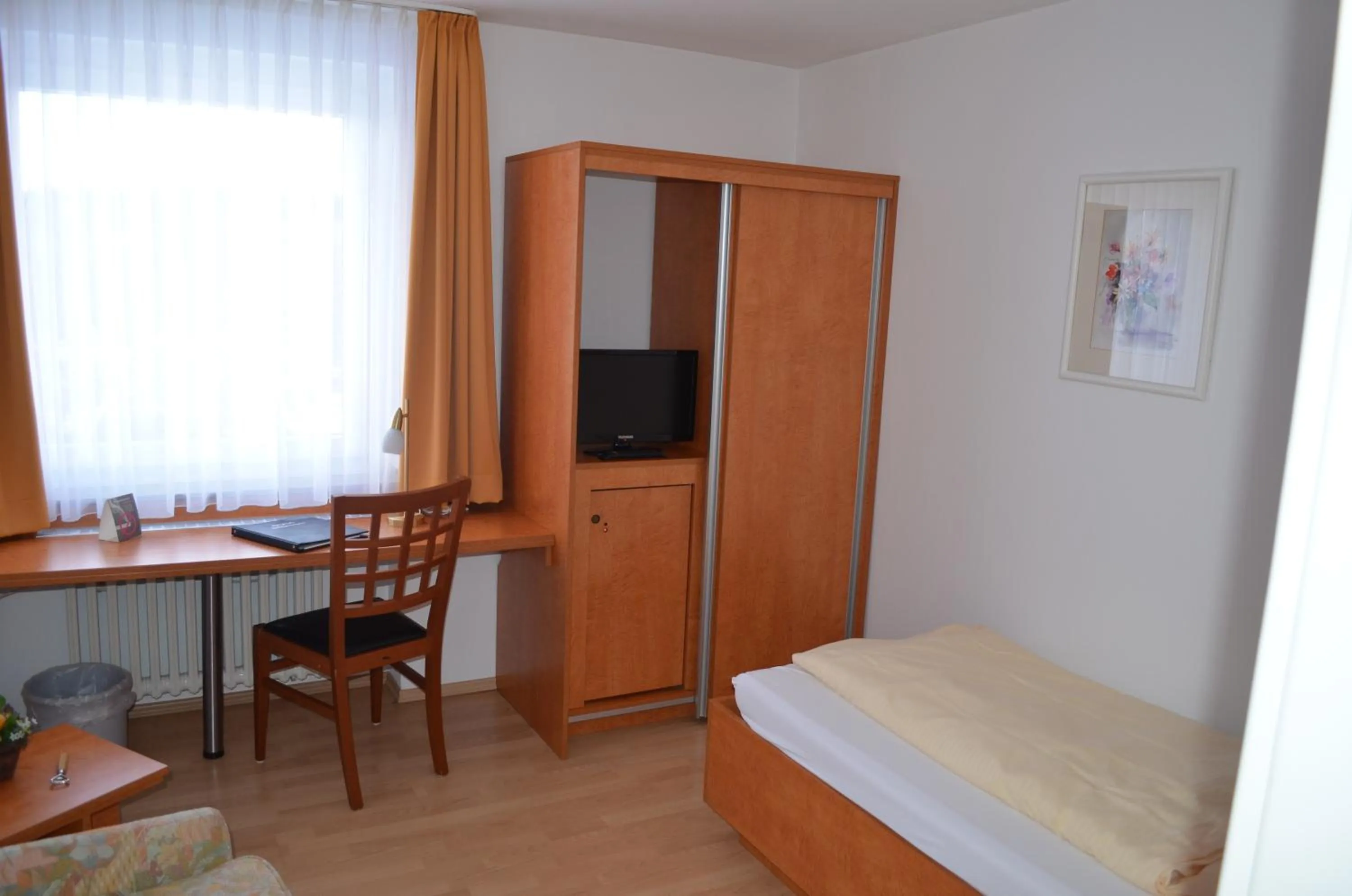 Bedroom in Gästehaus Wilgersdorf GmbH