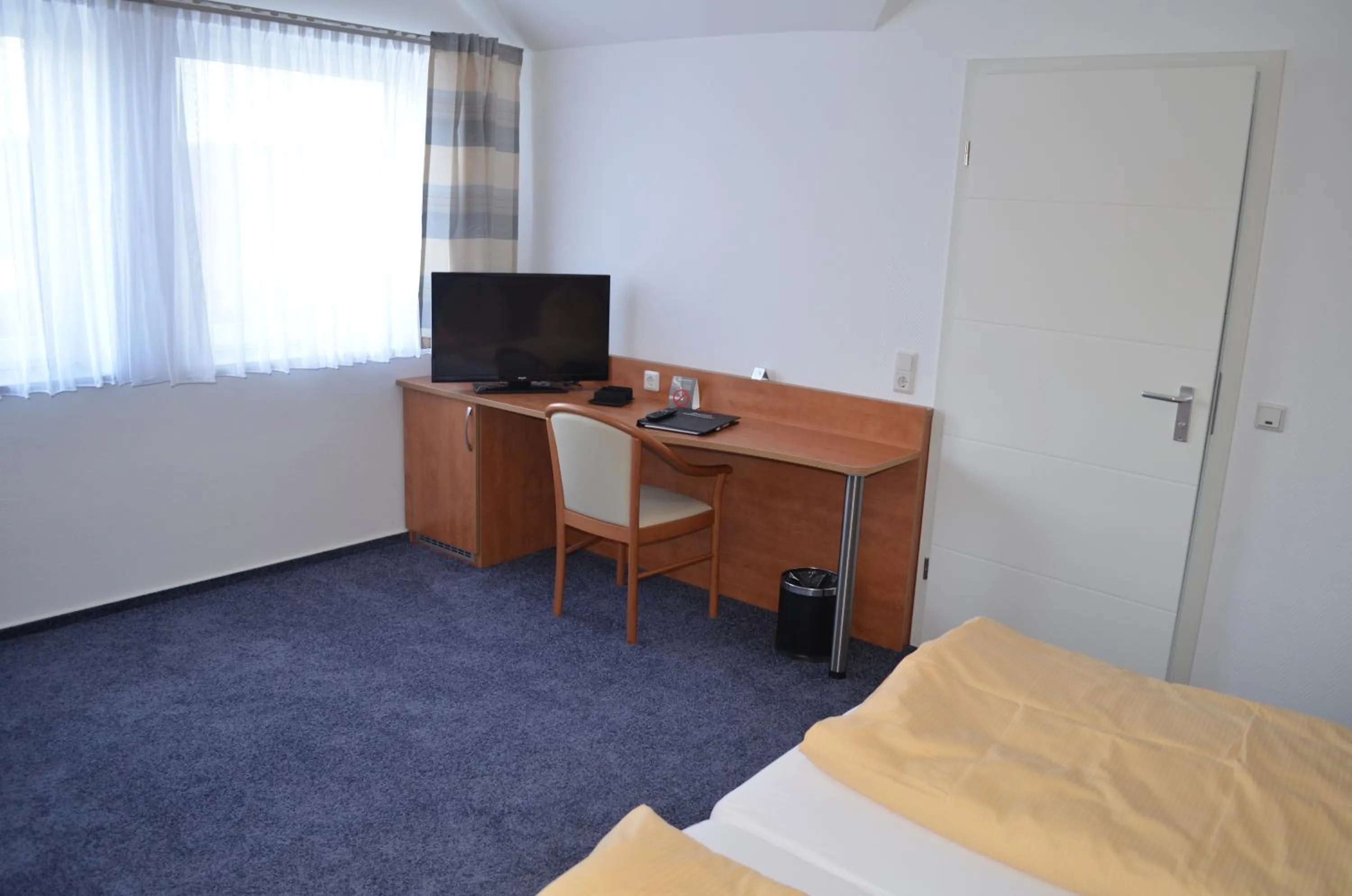 Bedroom in Gästehaus Wilgersdorf GmbH