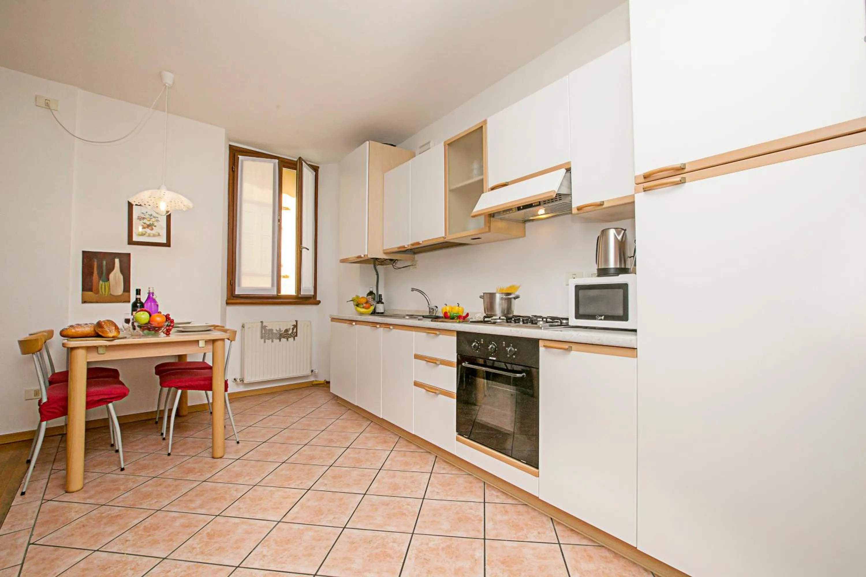 Kitchen or kitchenette in Appartamento Centro Storico Riva 2 - Happy Rentals