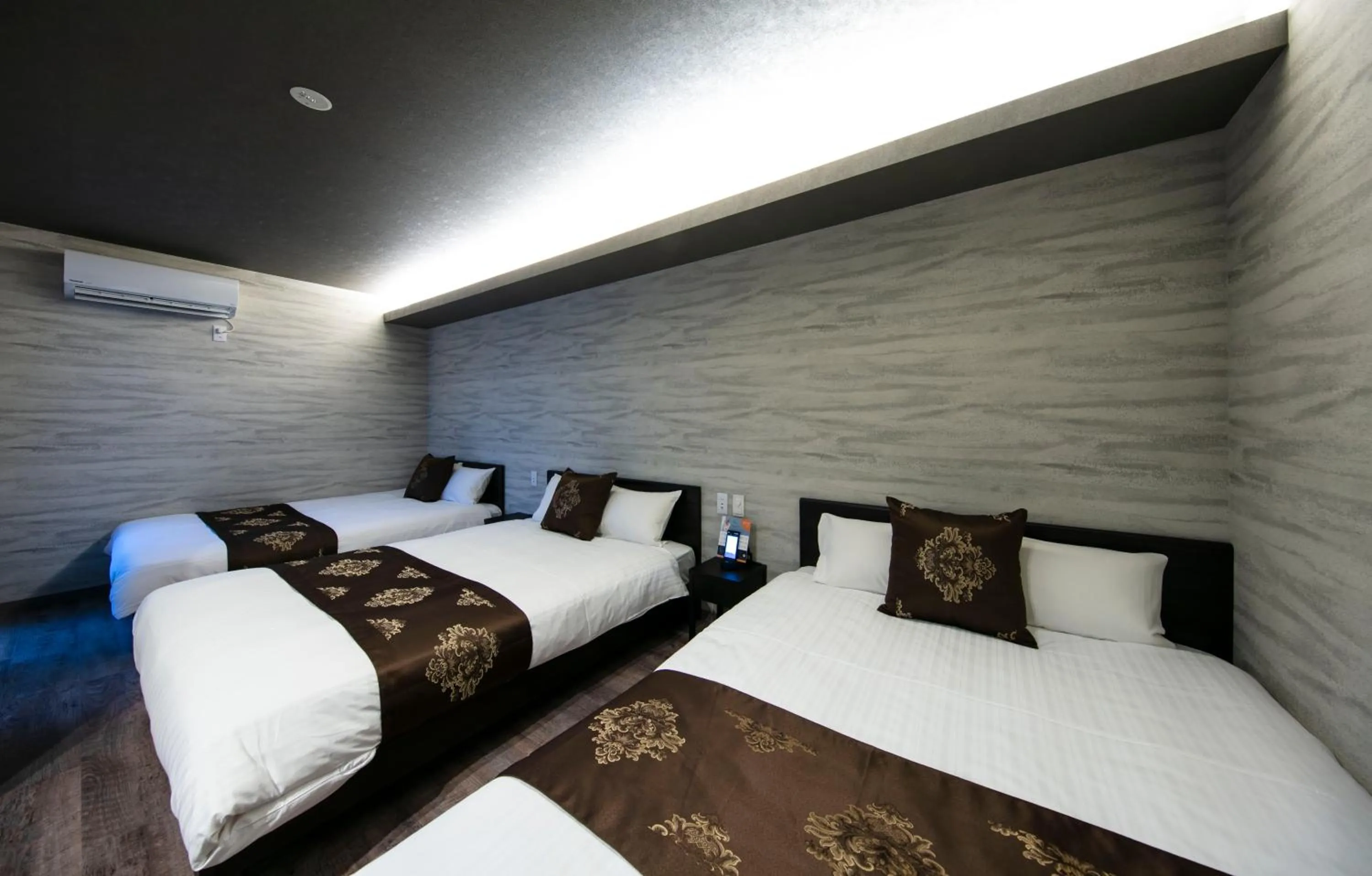 Bed in GRAND BASE Takamatsu