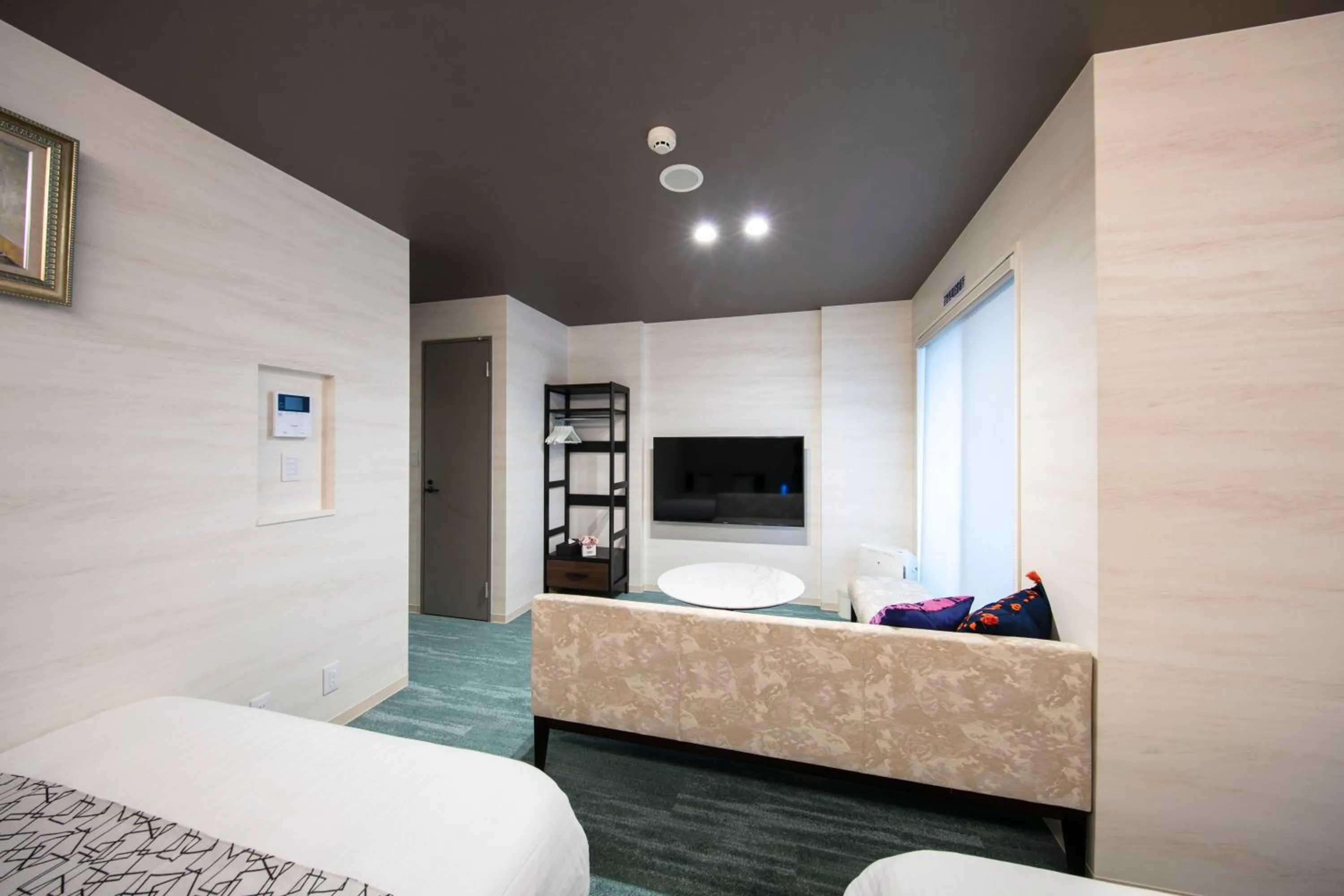 Photo of the whole room, Bed in GRAND BASE Takamatsu