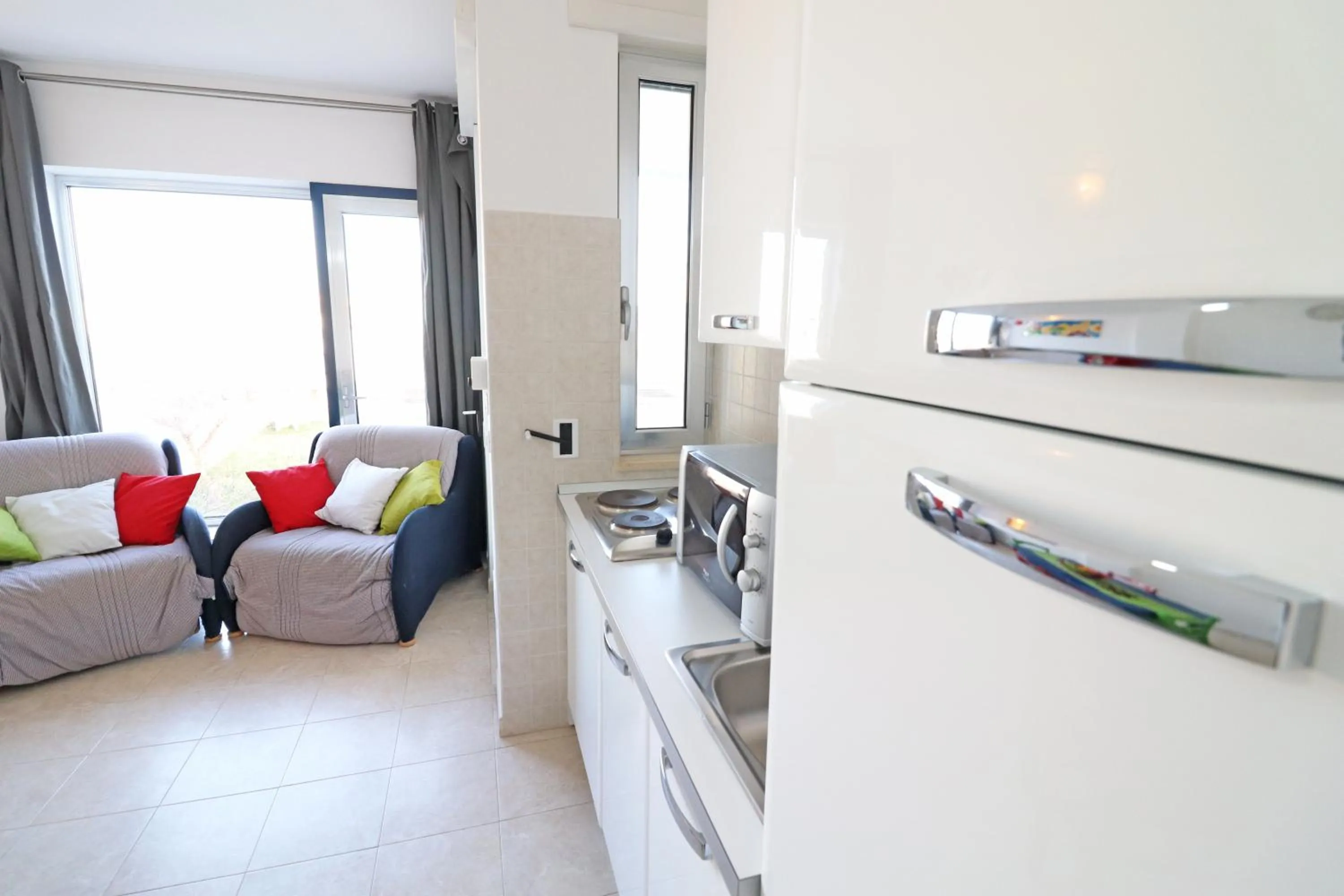 Restaurant/places to eat, Kitchen/Kitchenette in Holiday home angel in Otranto, apartment with 4 beds, with sea view.