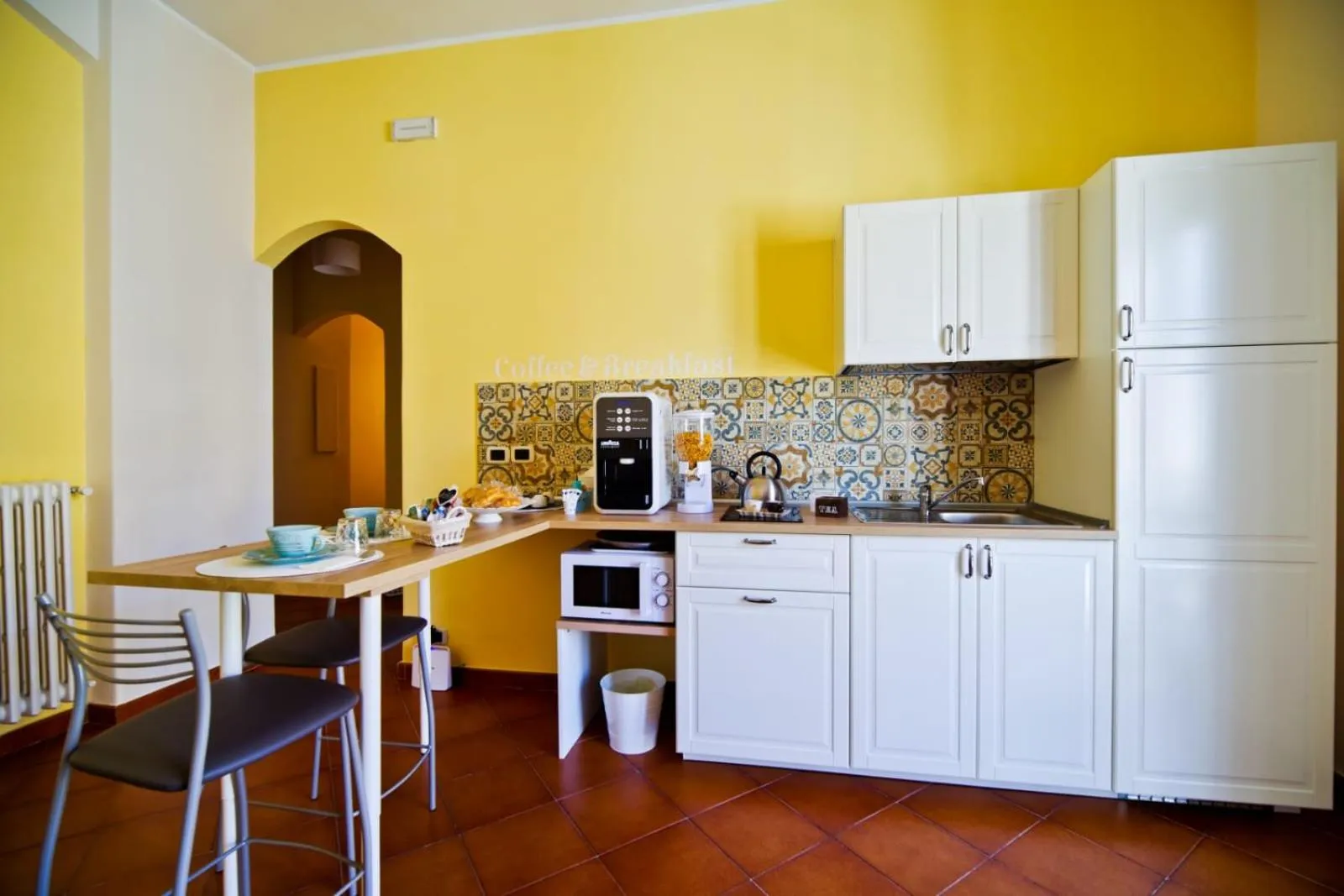 Kitchen or kitchenette in B&B il Faro