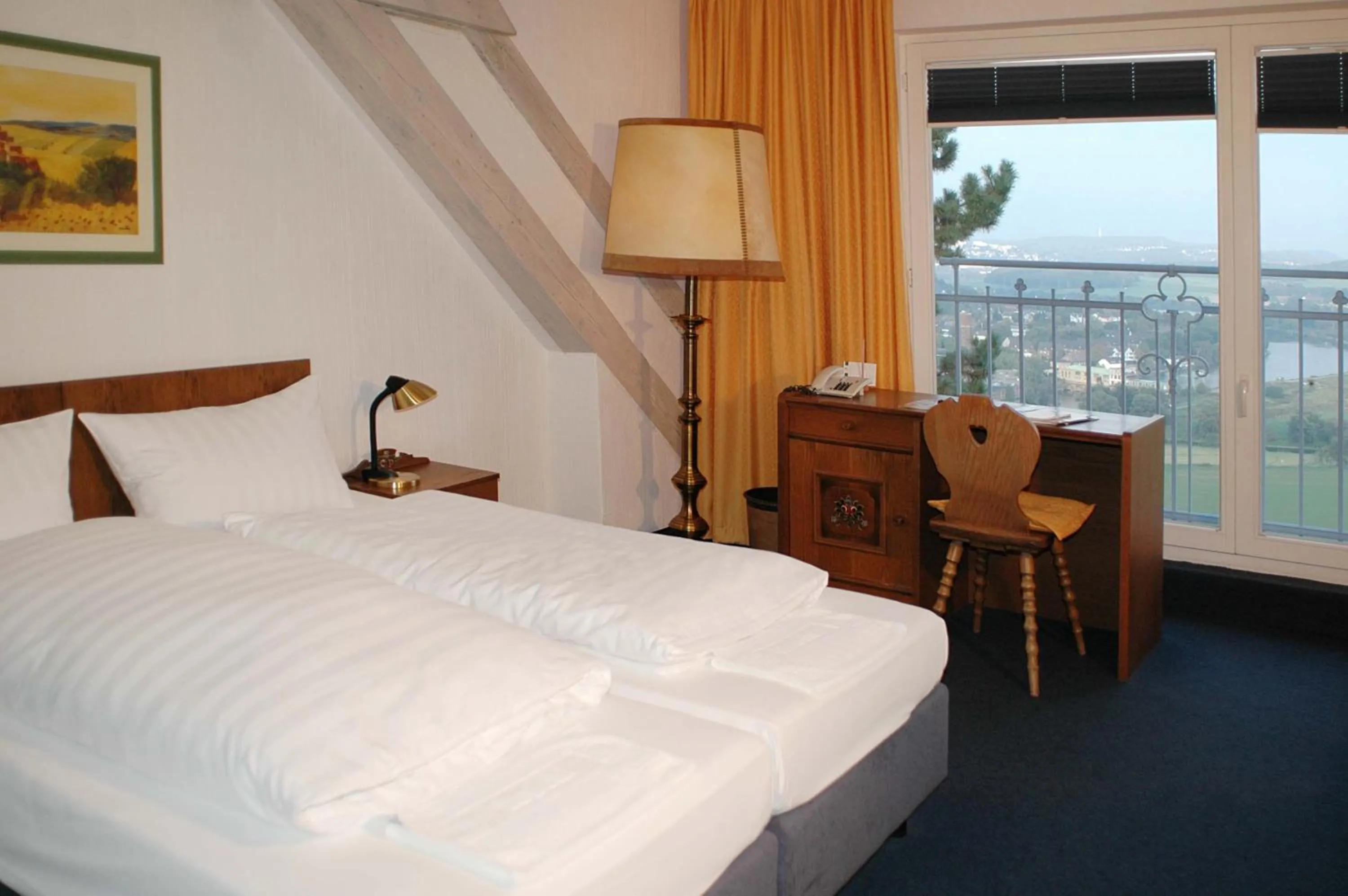 Photo of the whole room, Bed in Burghotel Volmarstein