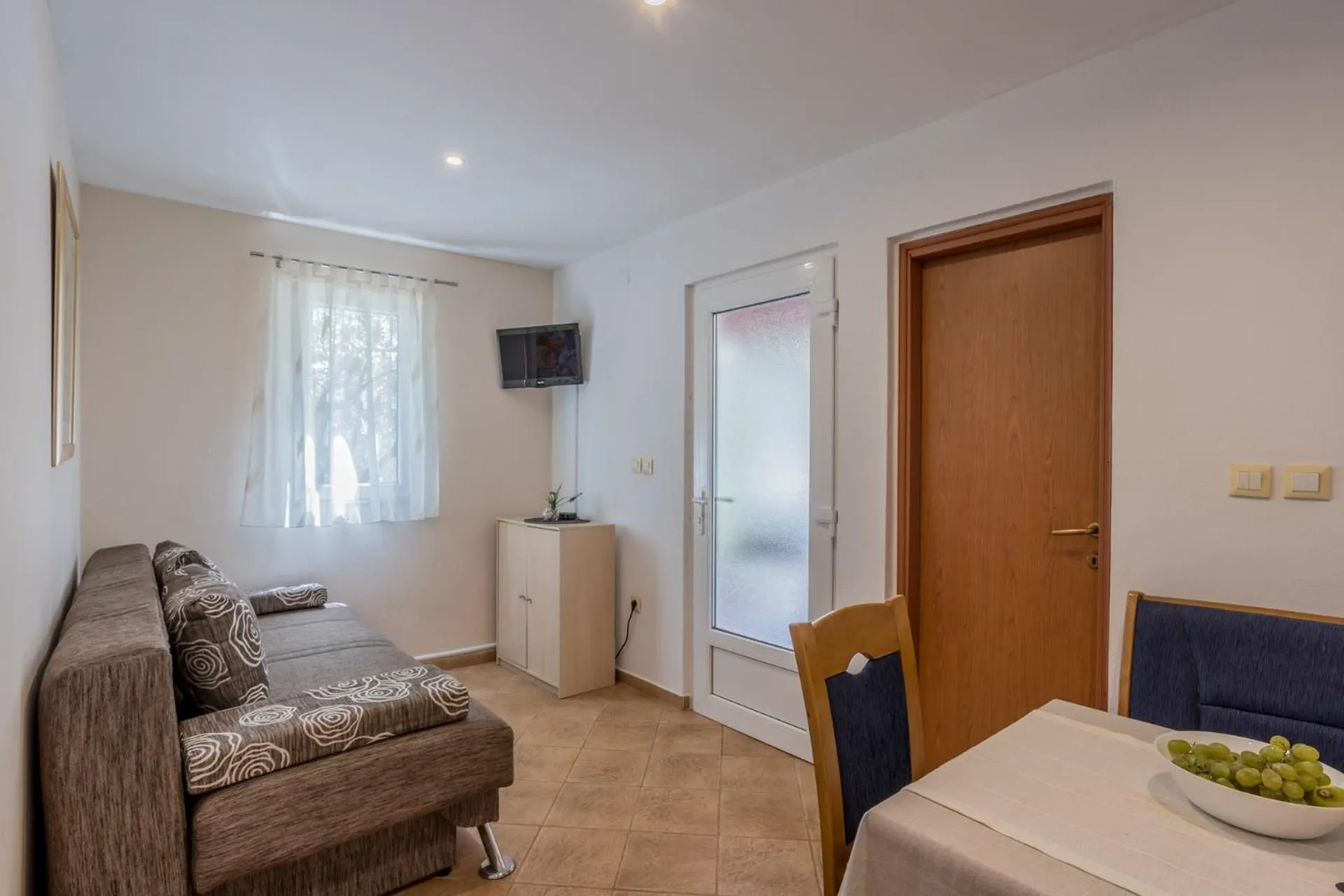 Seating Area in House with big walled oliva garden