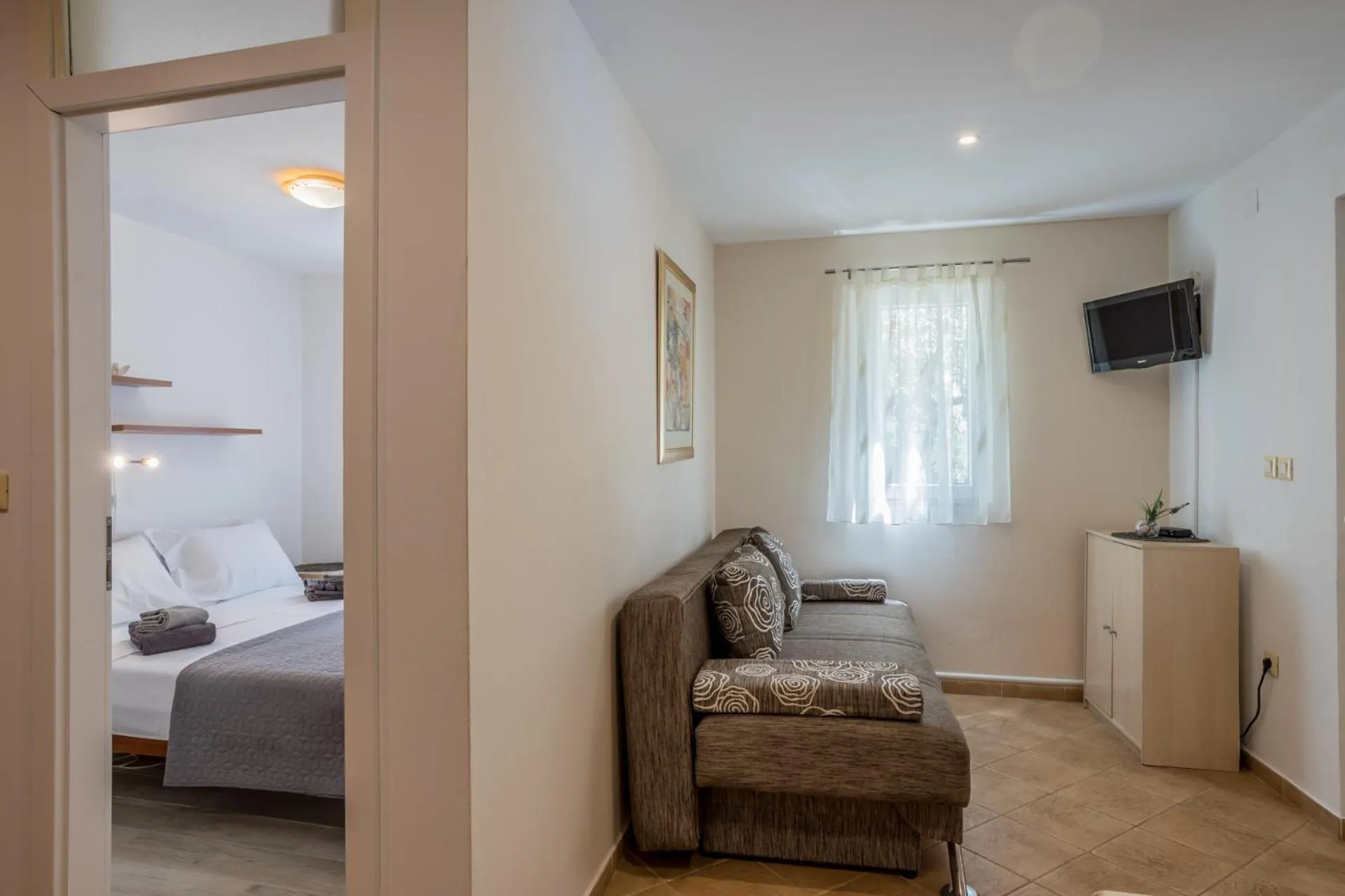 Seating Area in House with big walled oliva garden