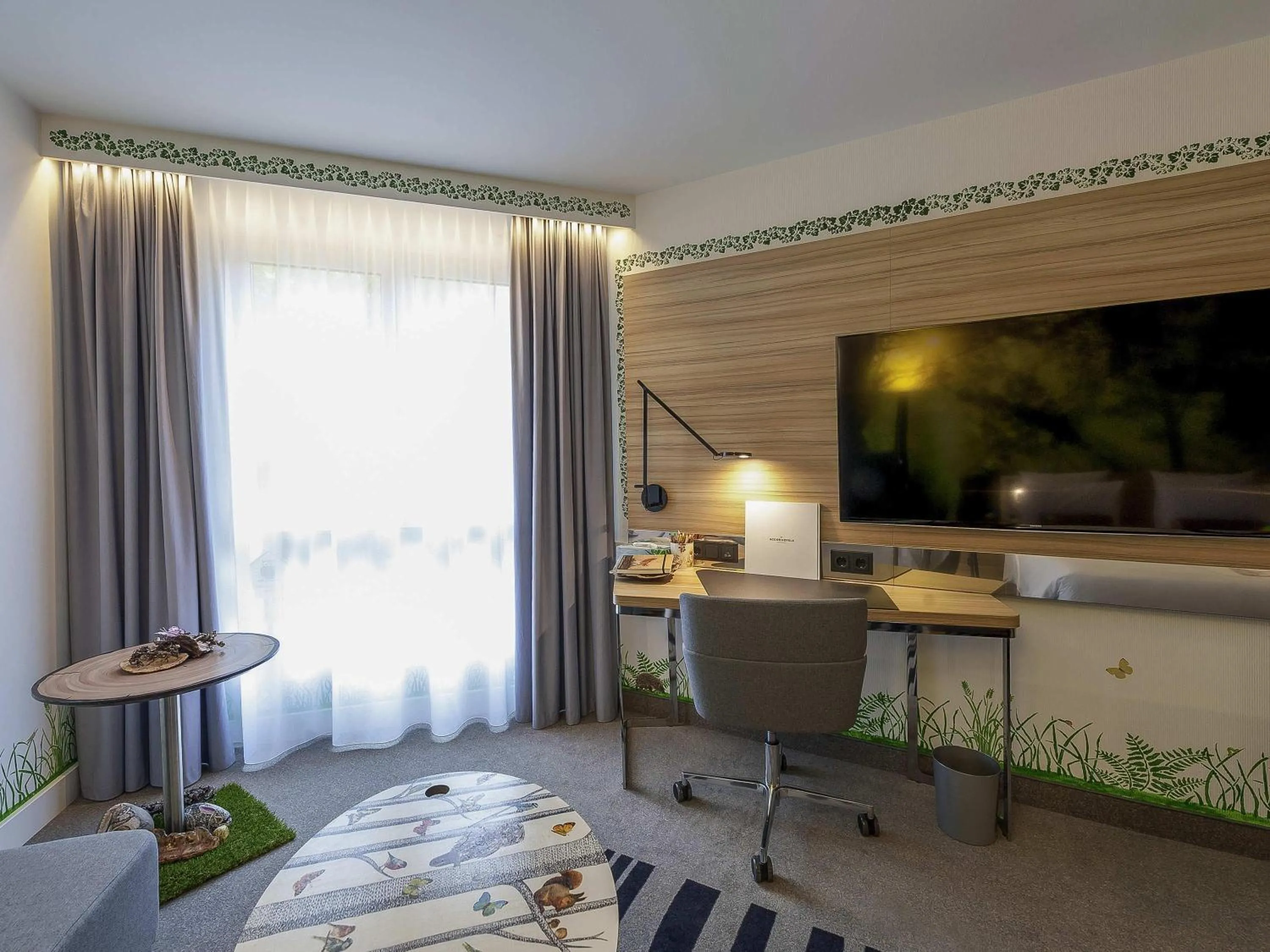 Bedroom in Novotel München City