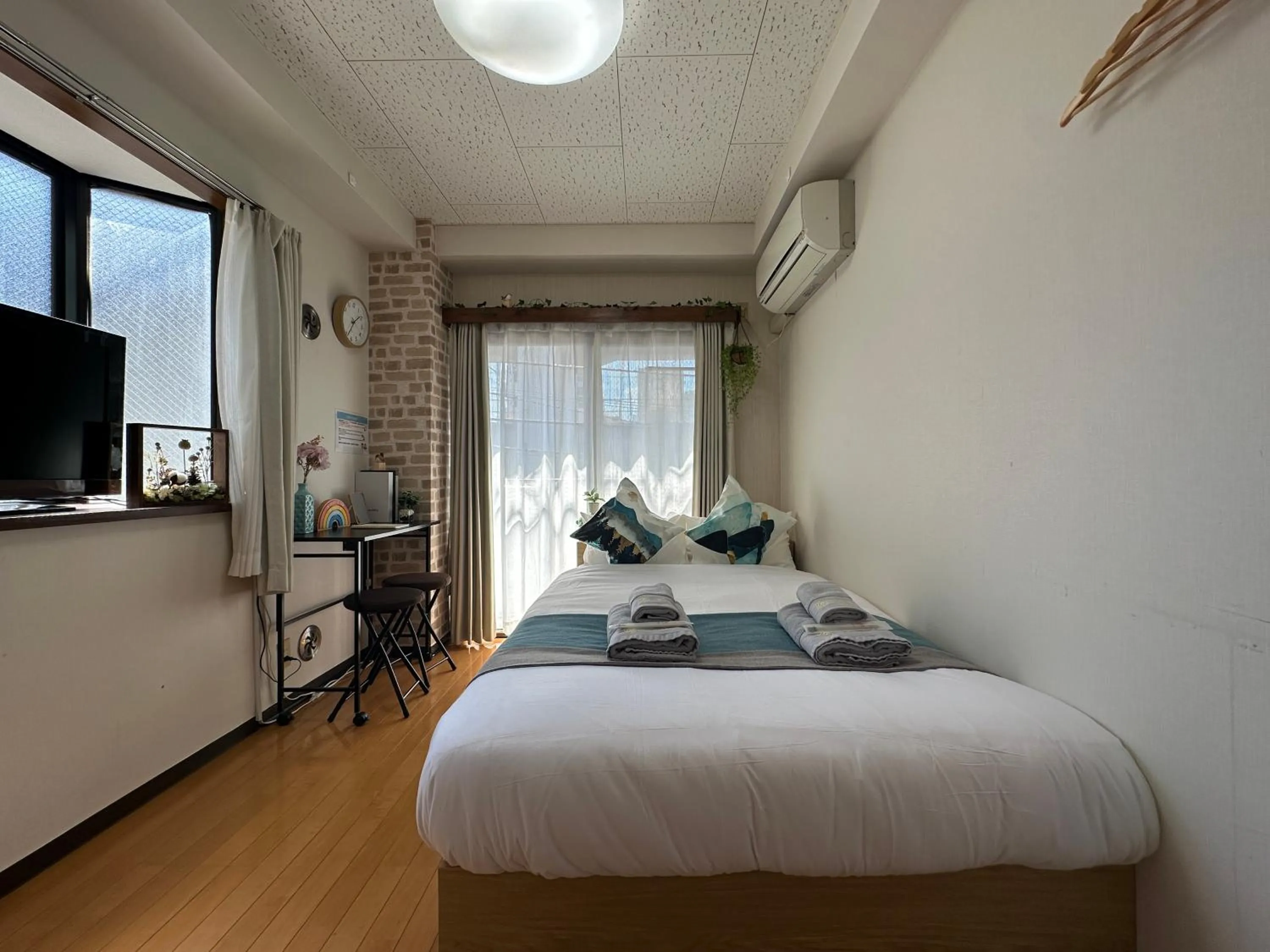 Bed in nestay suite tokyo tabata