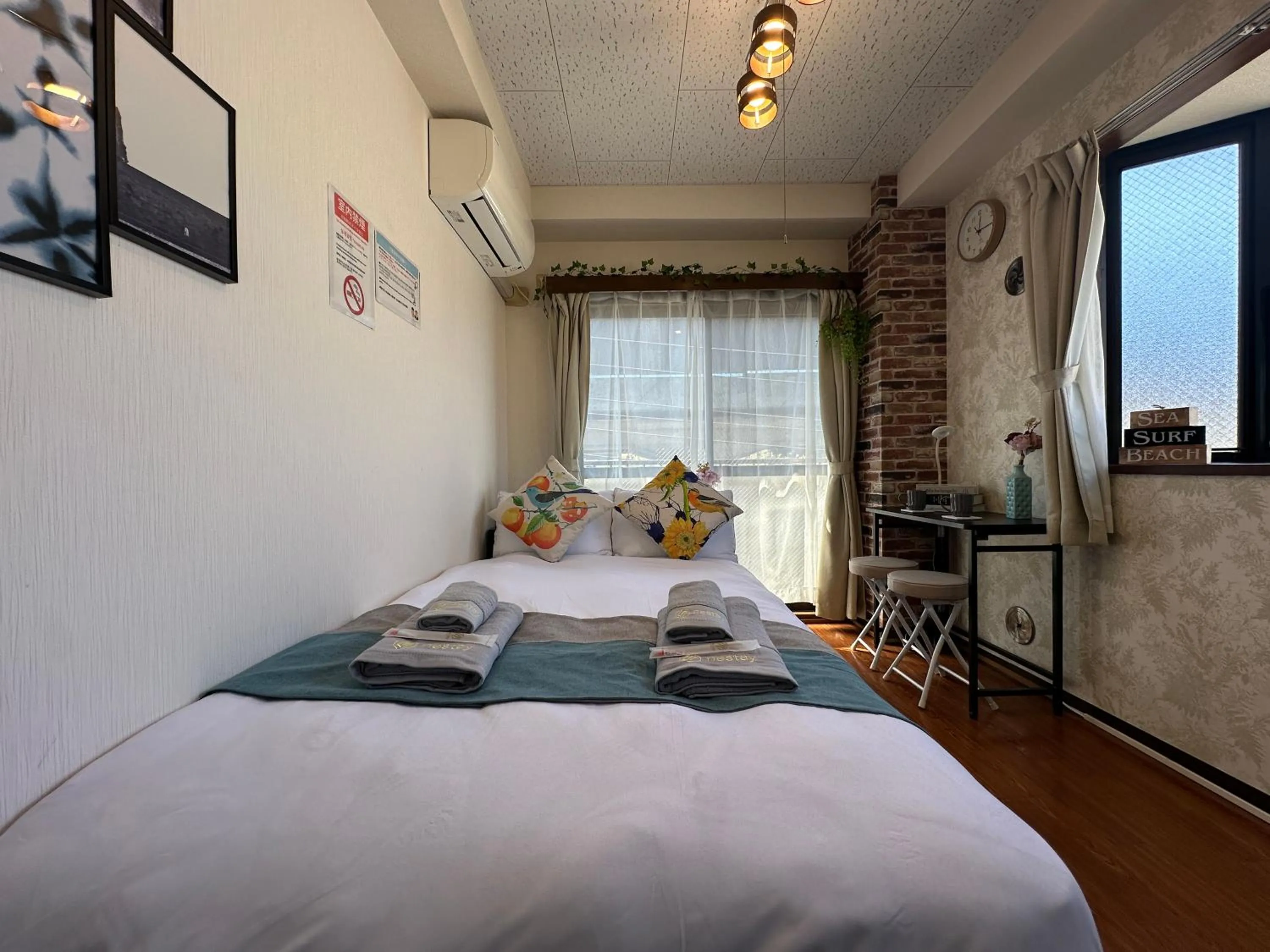 Bed in nestay suite tokyo tabata