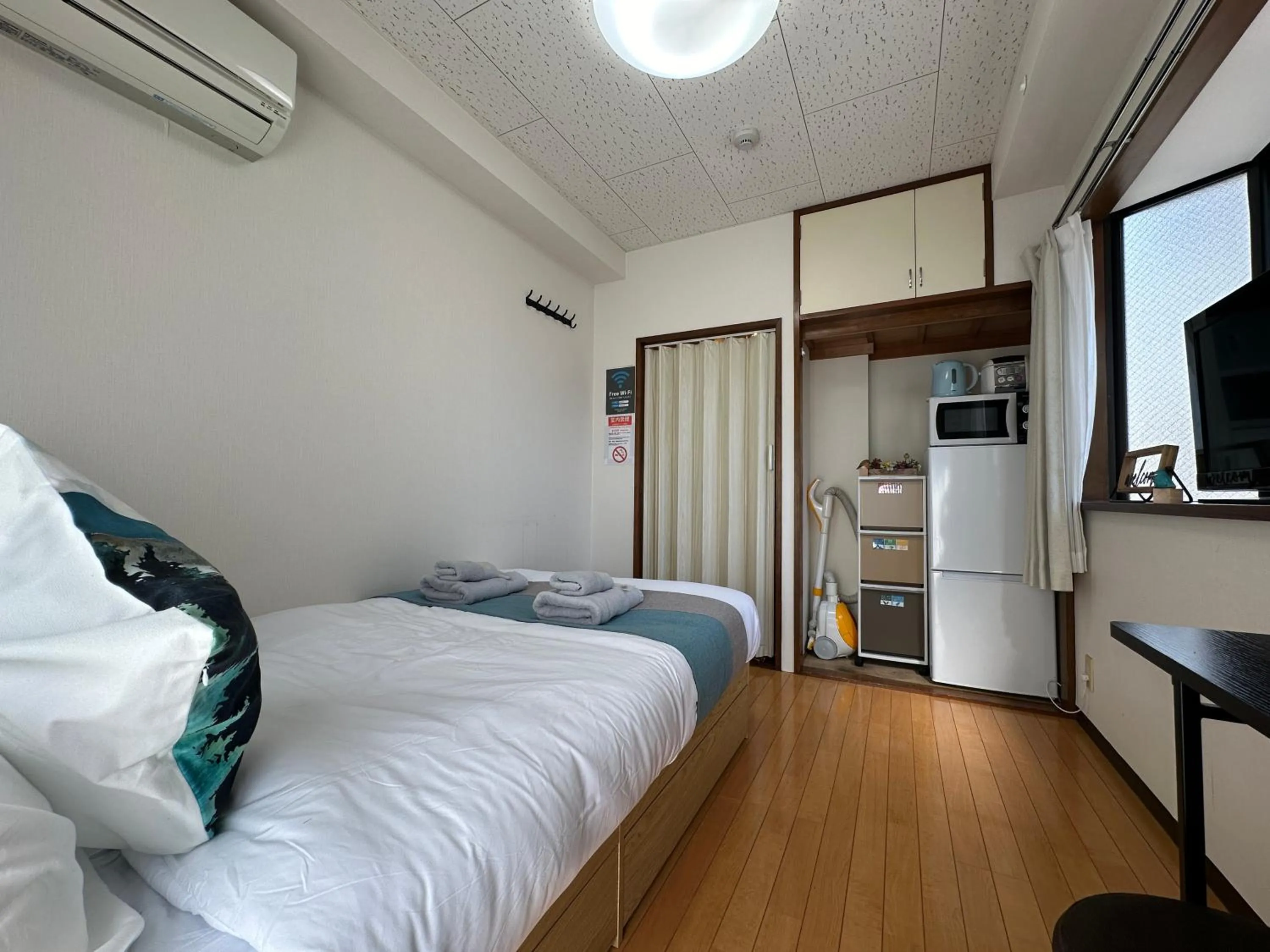 Bed in nestay suite tokyo tabata