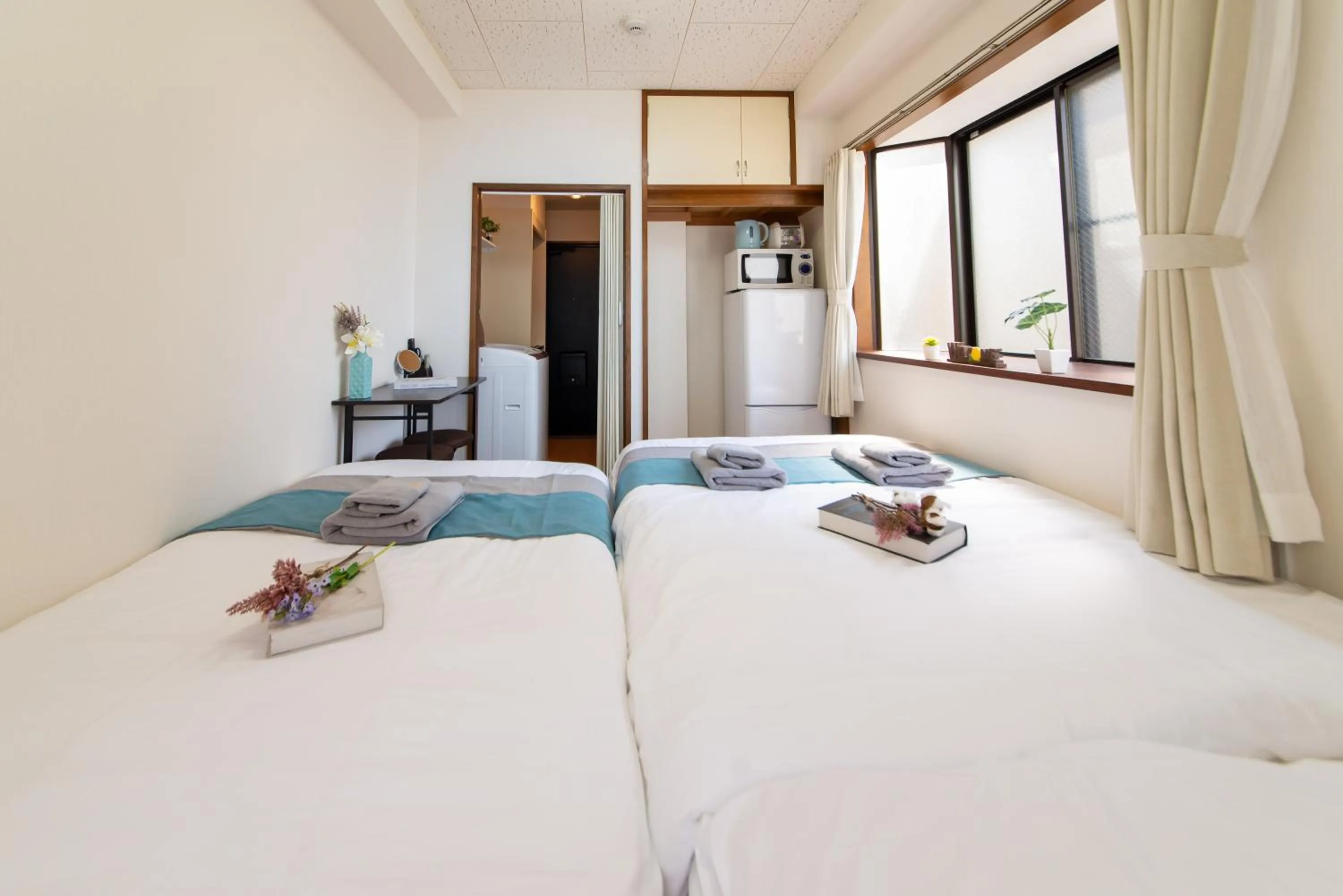 Bed in nestay suite tokyo tabata