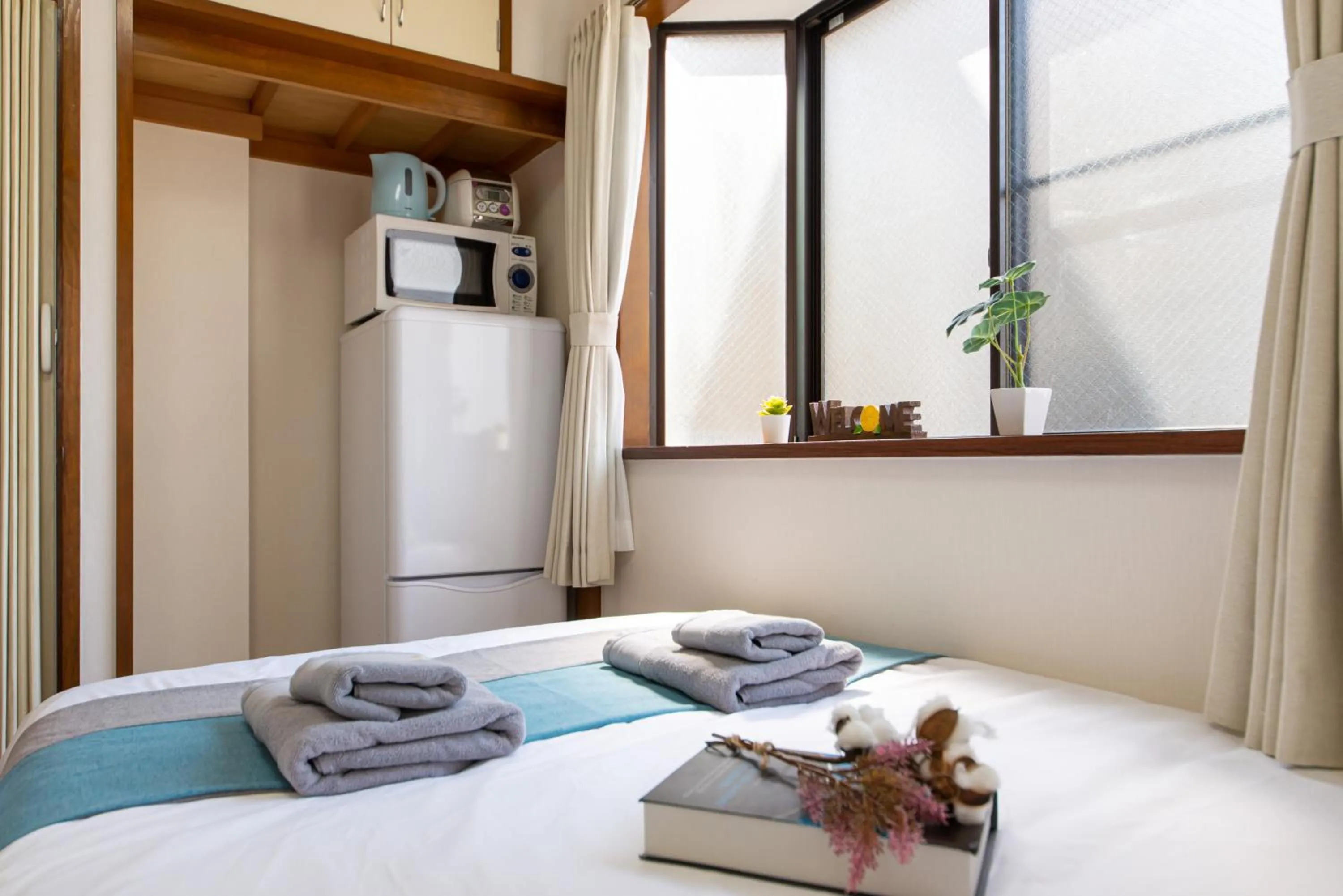 Bed in nestay suite tokyo tabata