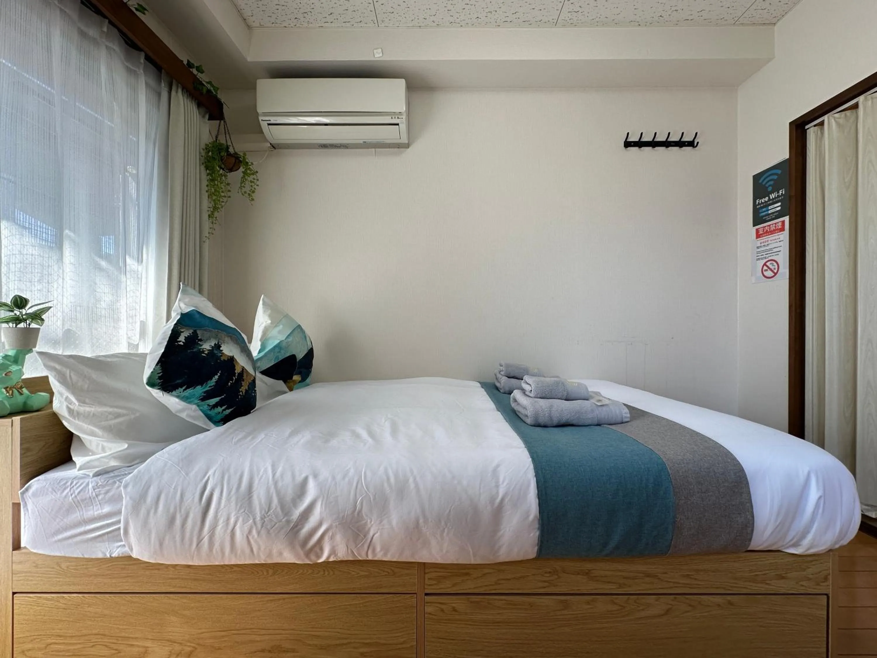 Bed in nestay suite tokyo tabata