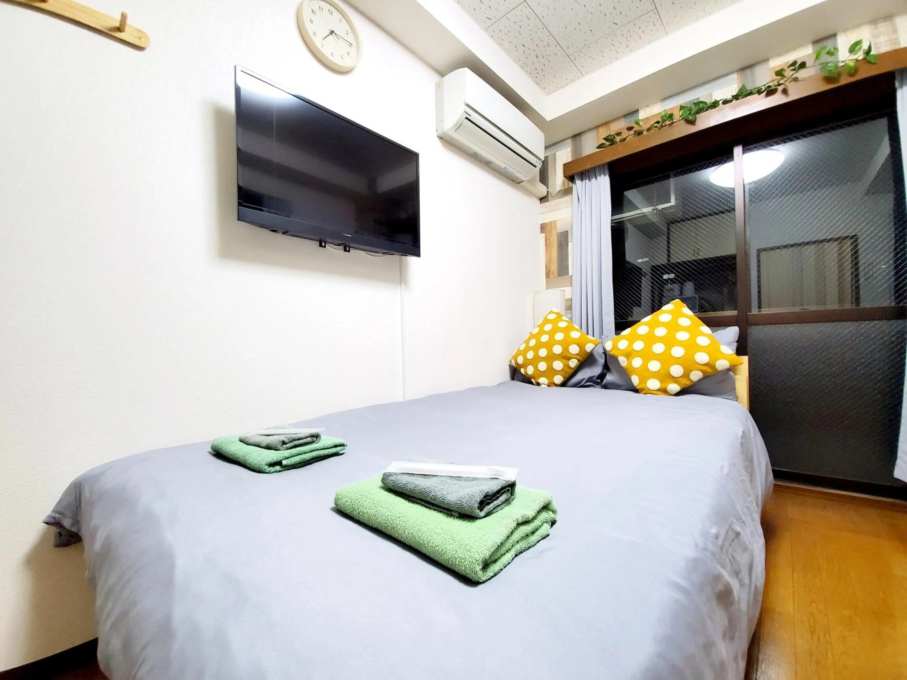 Bed in nestay suite tokyo tabata