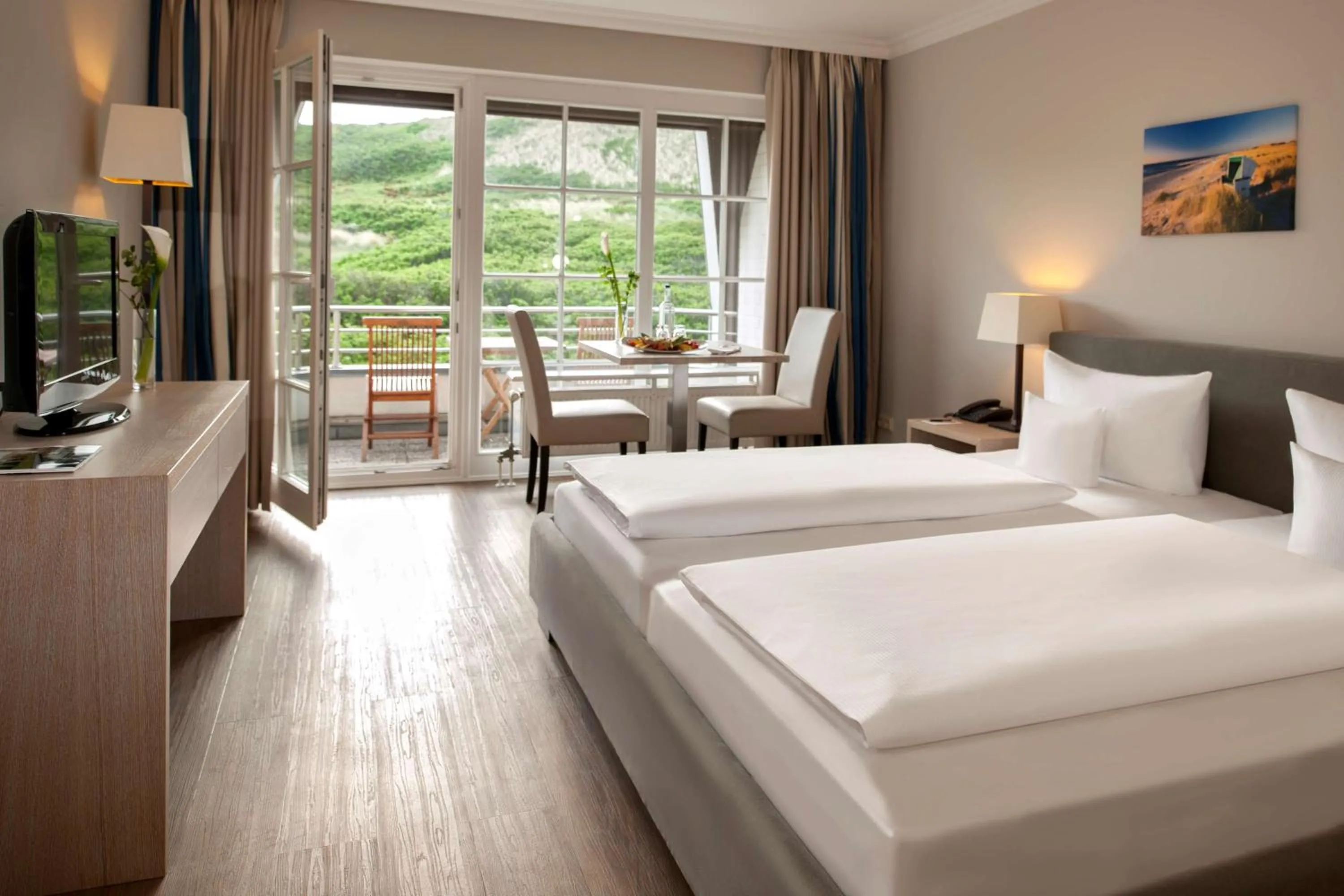 Photo of the whole room, Bed in Dorint Strandresort & Spa Westerland/Sylt