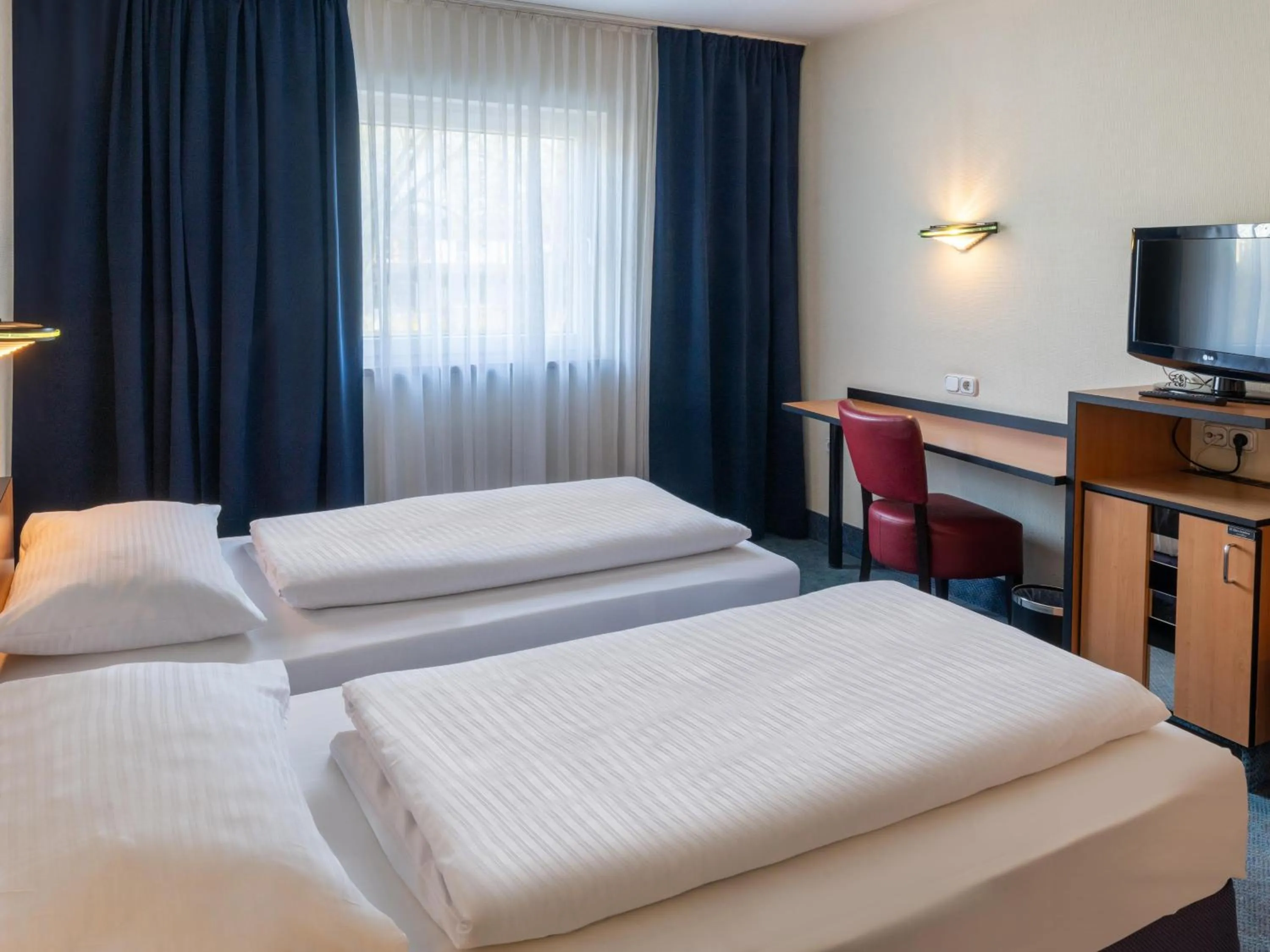 Photo of the whole room, Bed in Best Western Hotel de Ville