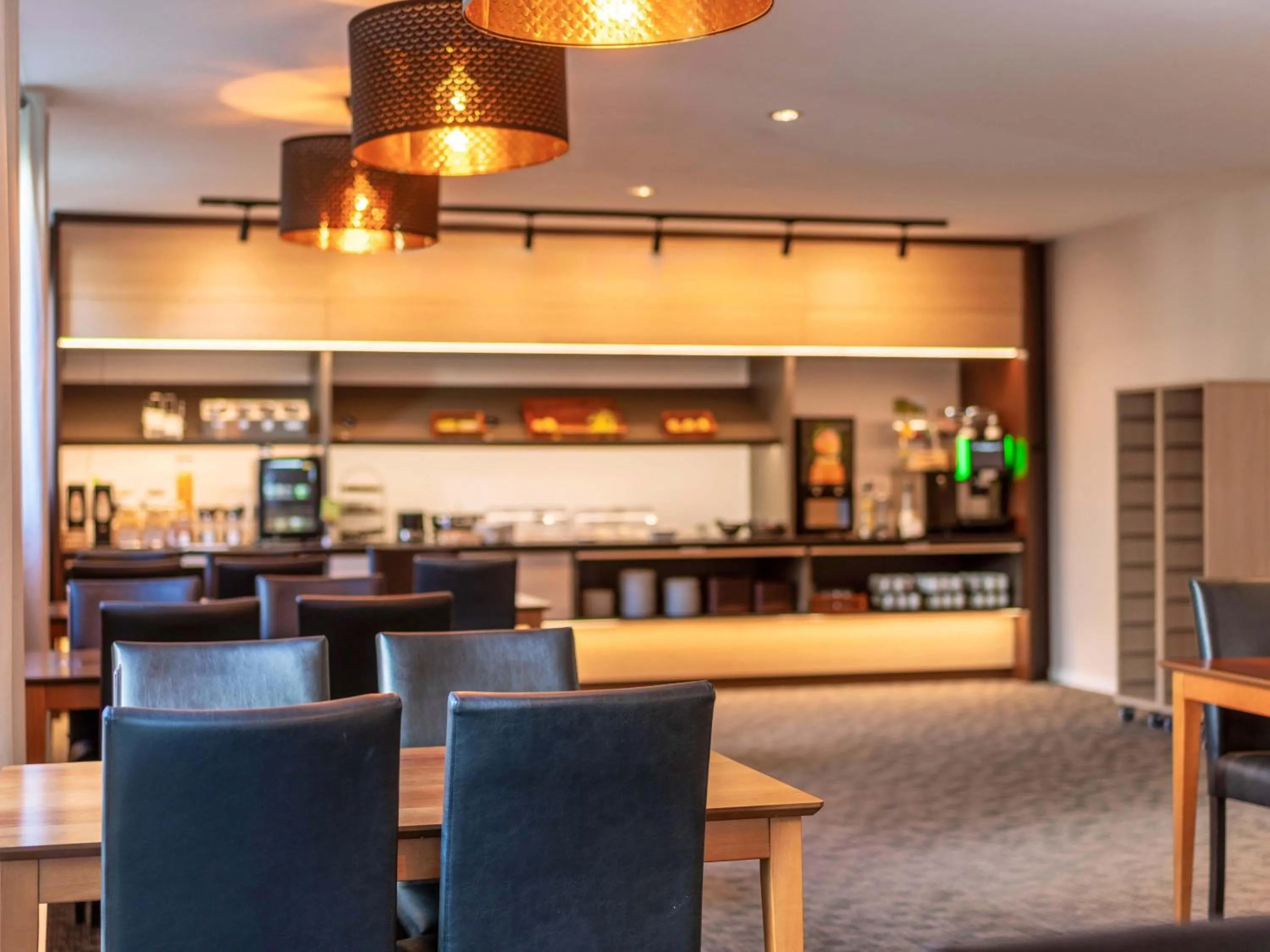 Lounge or bar in B&B HOTEL Eschweiler