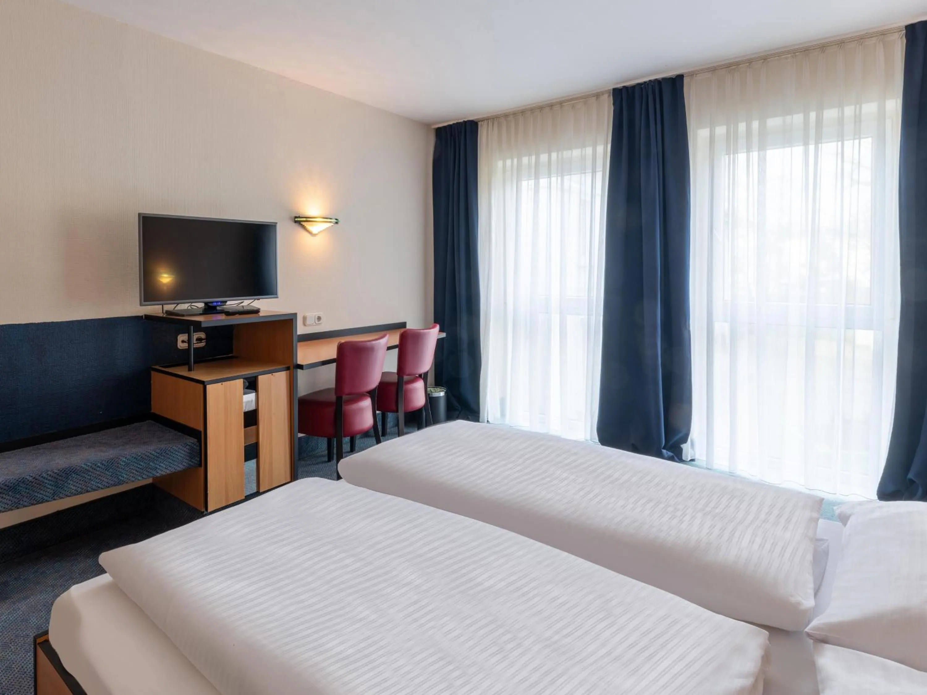 Photo of the whole room, Bed in Best Western Hotel de Ville