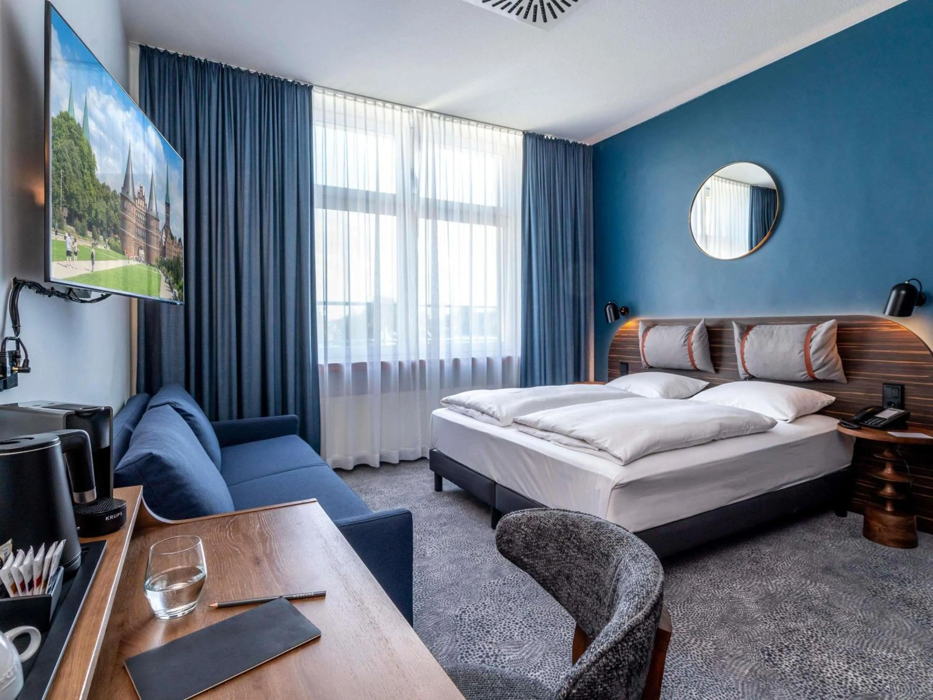 Bedroom, Bed in Mercure Hotel Luebeck City Center