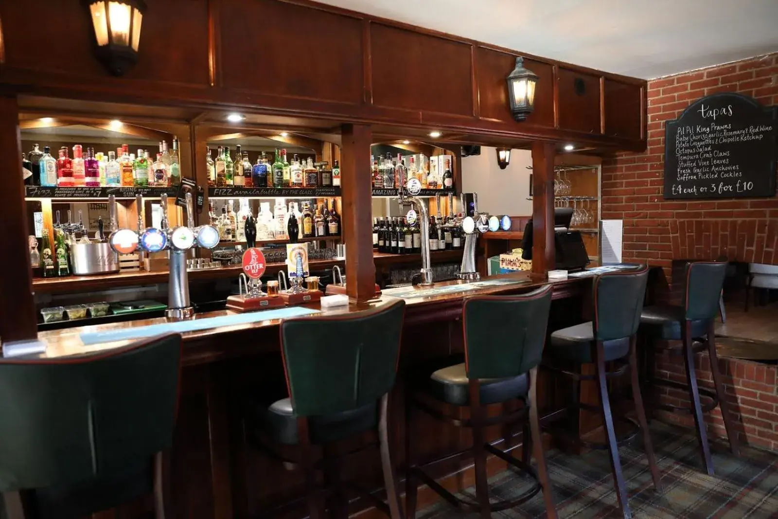 Lounge or bar in The Rising Sun Lounge or bar in The Rising Sun