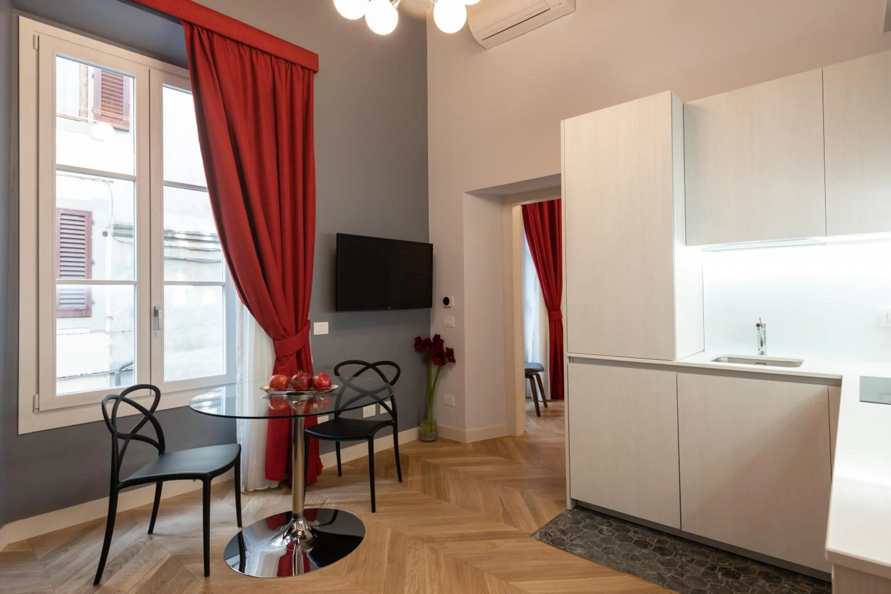 Dining area in Kairos by Florence Art Apartments