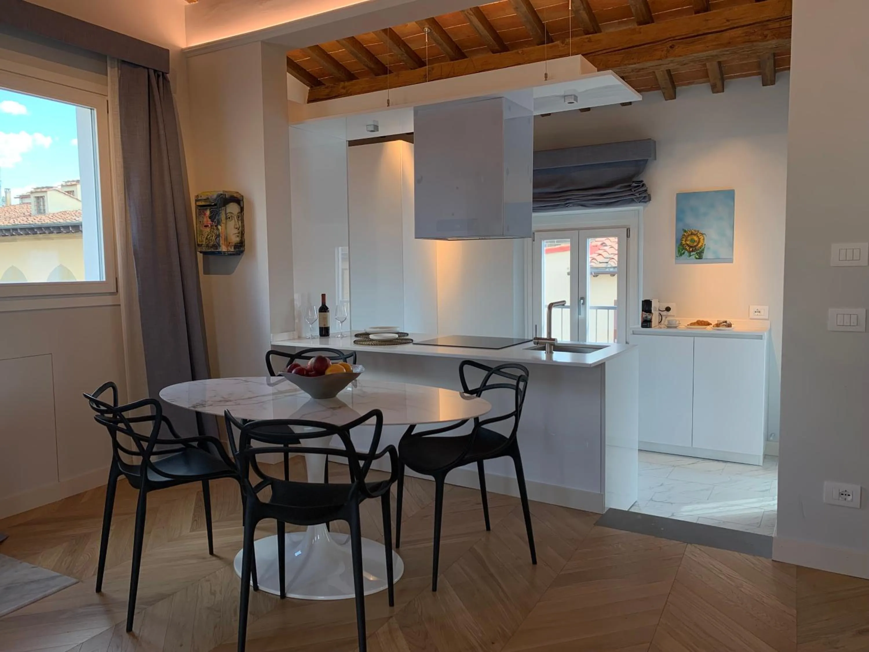 Dining area in Kairos by Florence Art Apartments