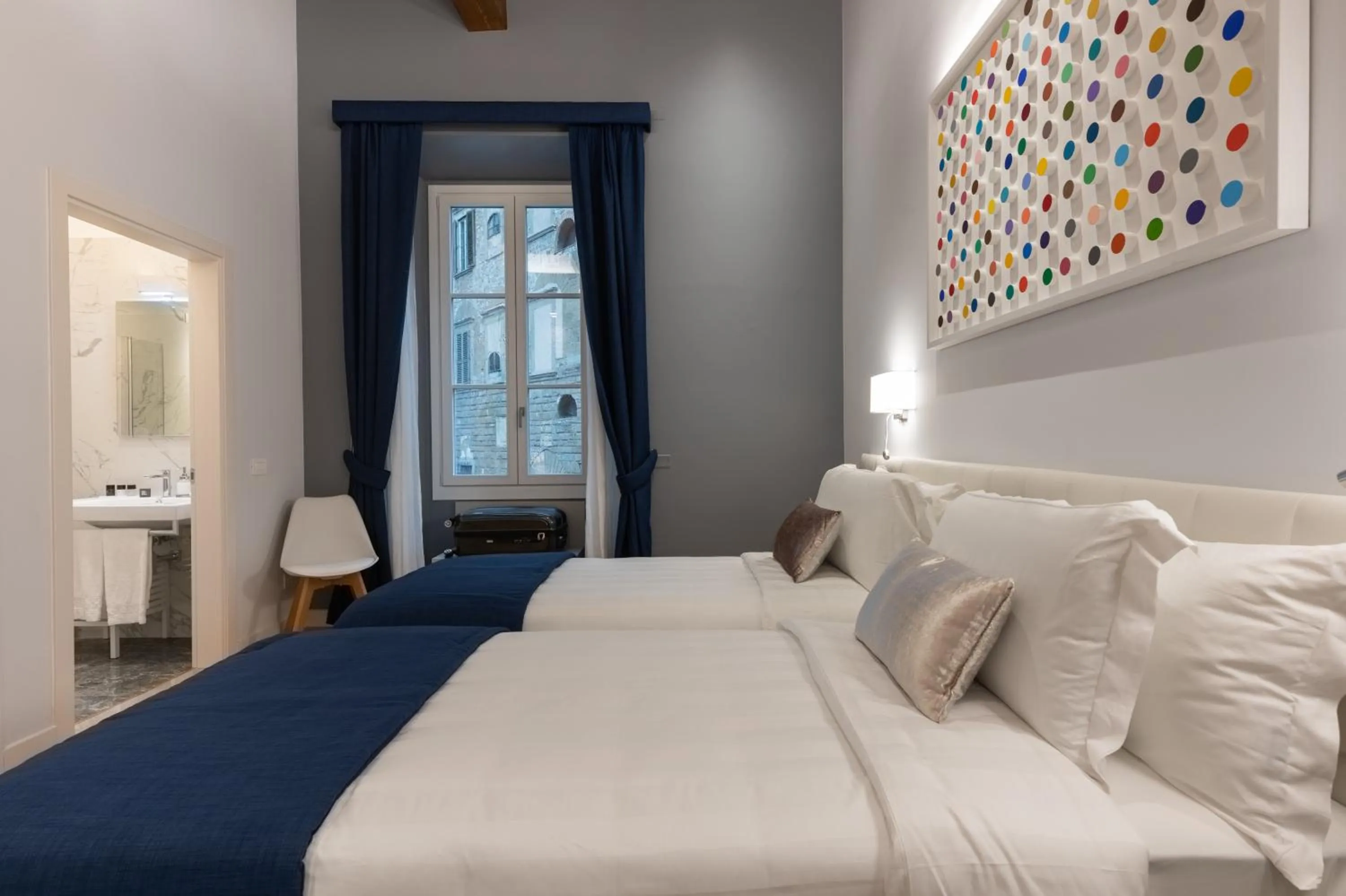 Bed in Kairos by Florence Art Apartments