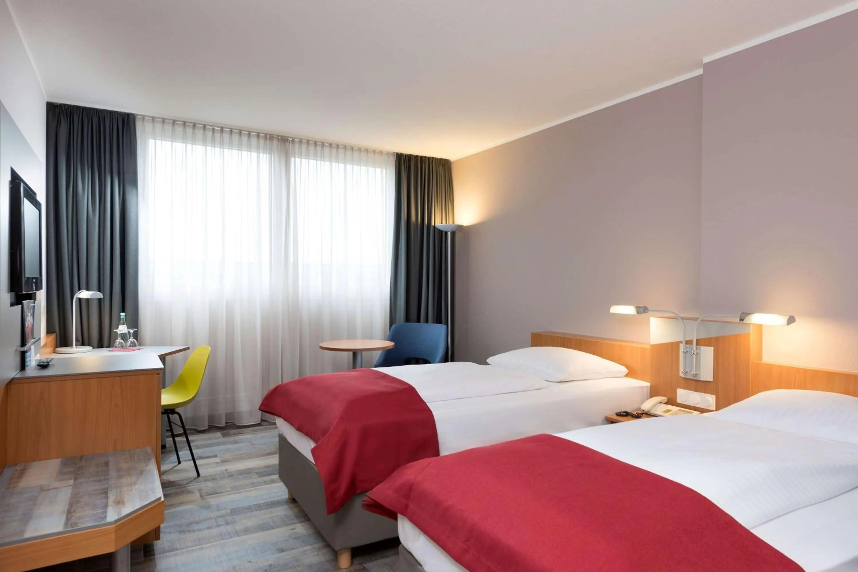 Photo of the whole room, Bed in Ramada by Wyndham Hannover Messe