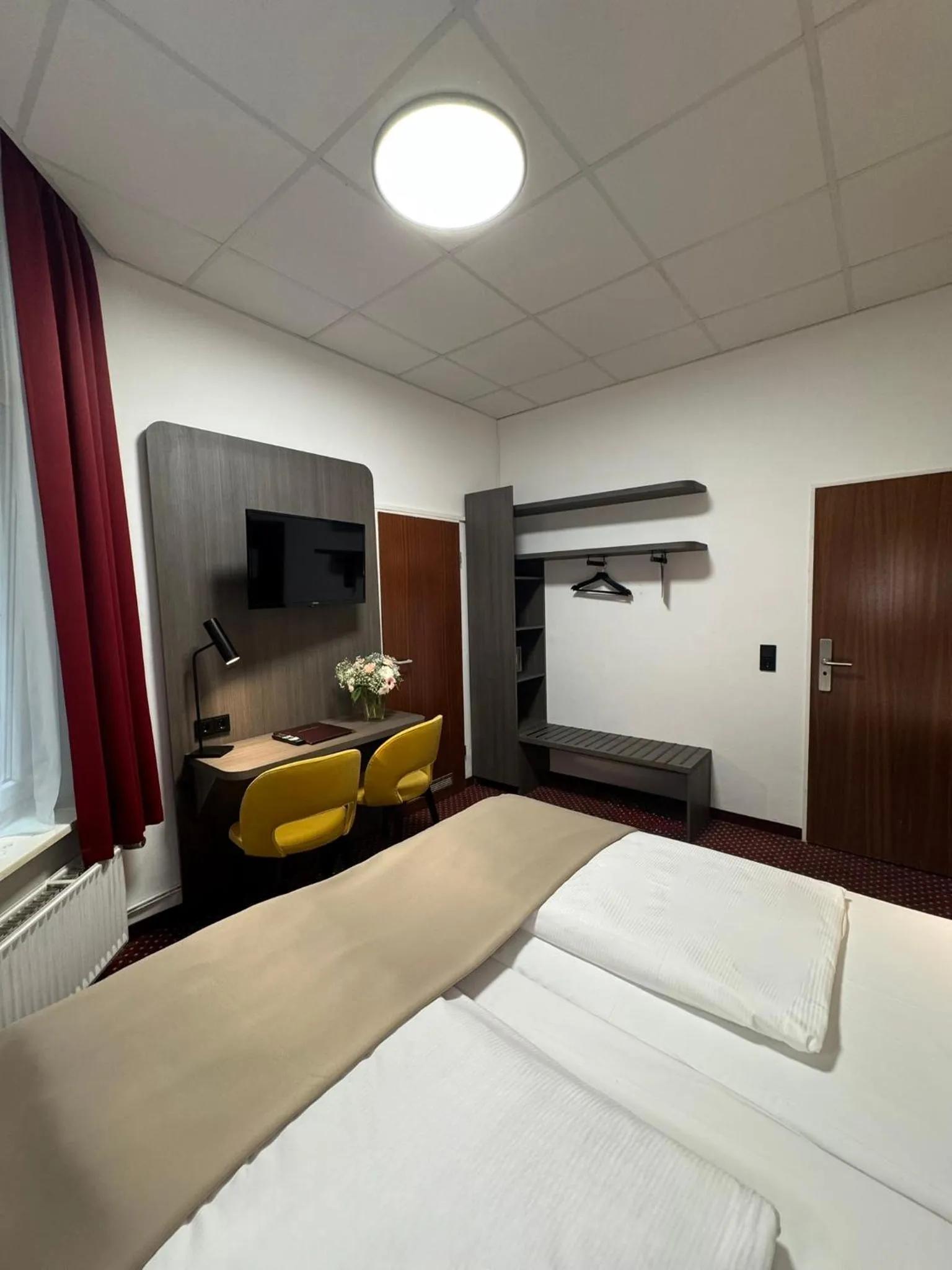 Bed in Hotel Lumen am Hauptbahnhof