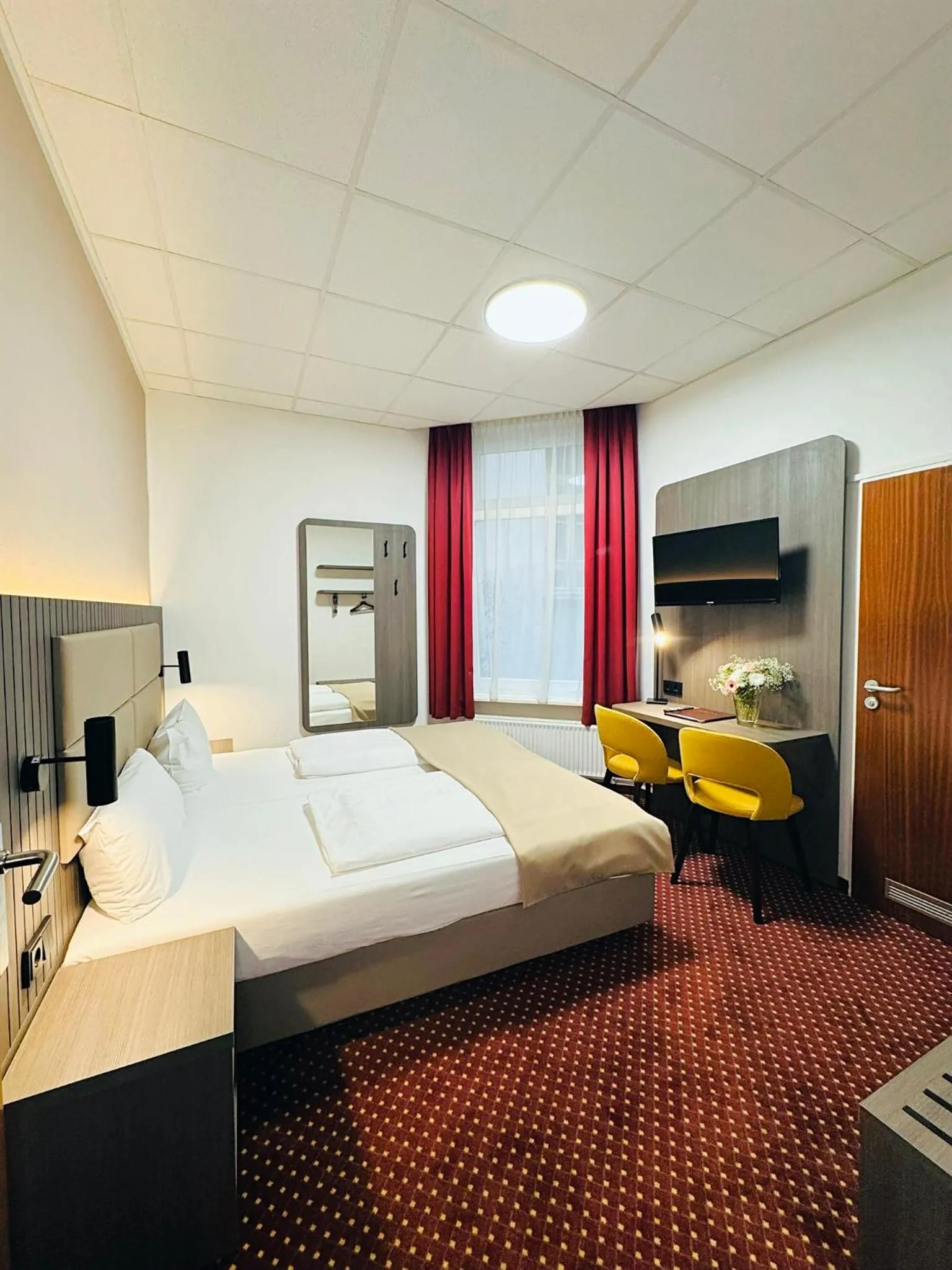 Bed in Hotel Lumen am Hauptbahnhof