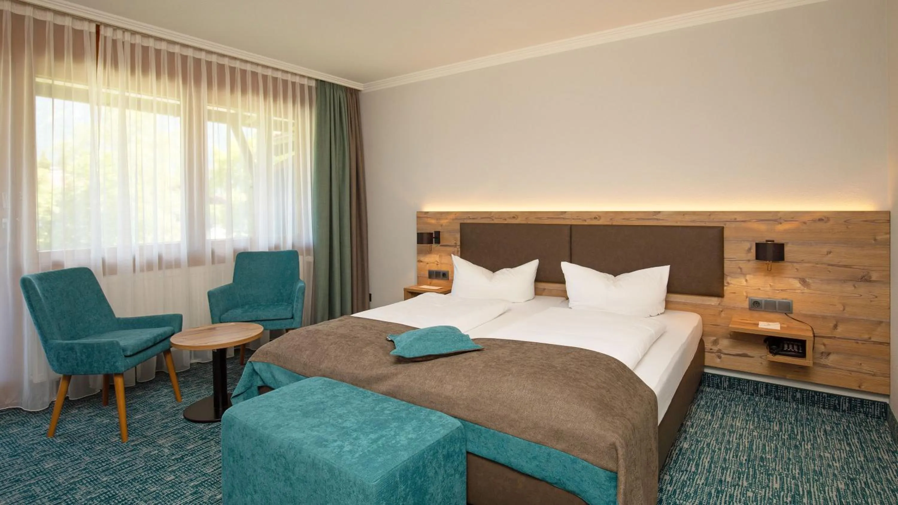 Photo of the whole room, Bed in Das Wiesgauer - Alpenhotel Inzell