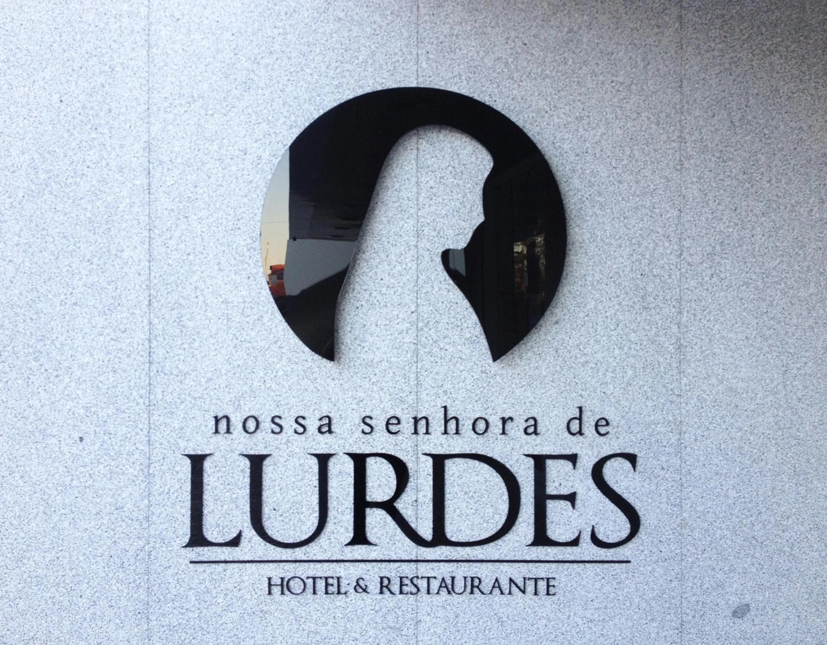 Property logo or sign in Hotel Nossa Senhora de Lurdes