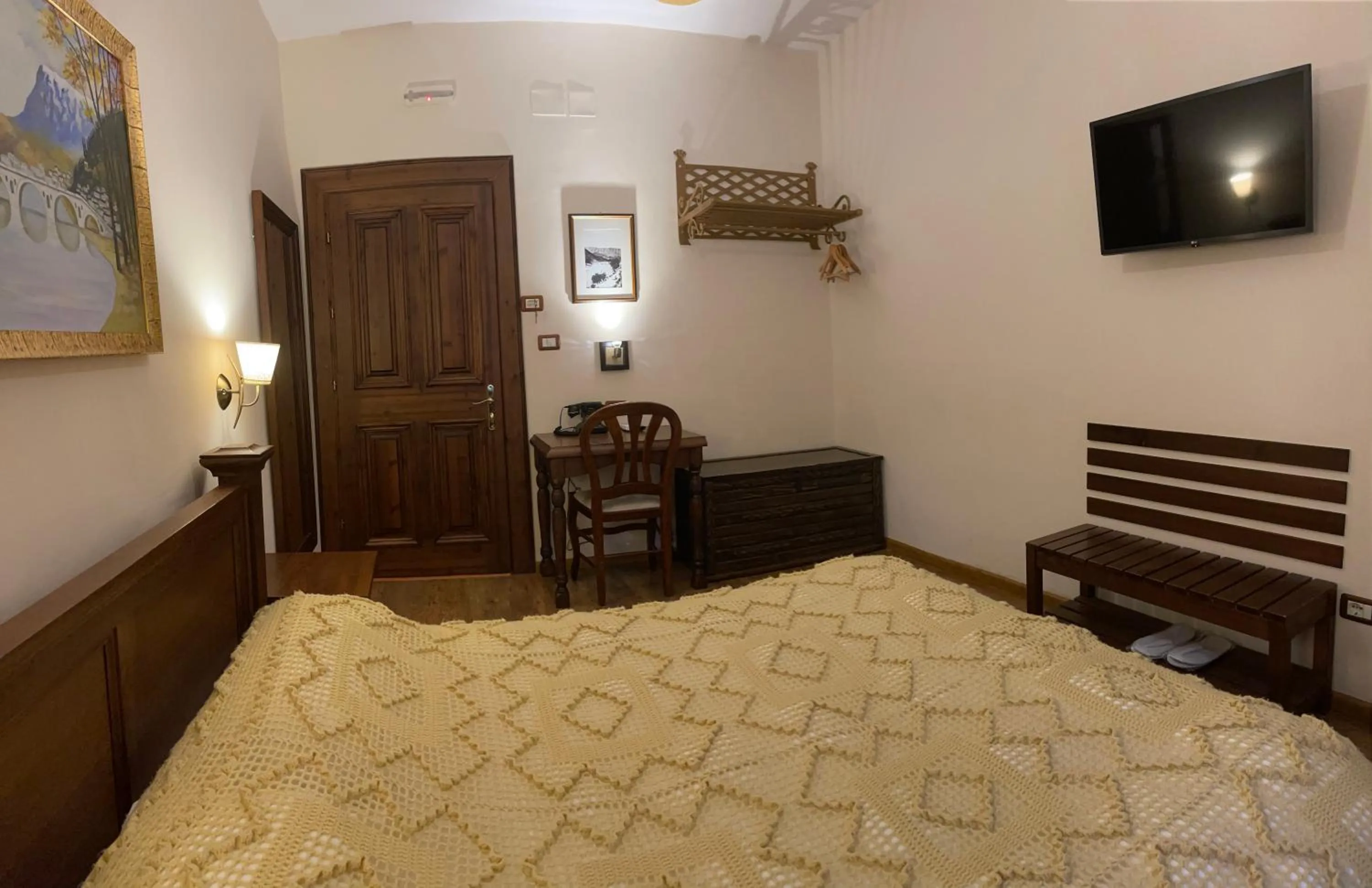 Bed in Hotel Mangalemi