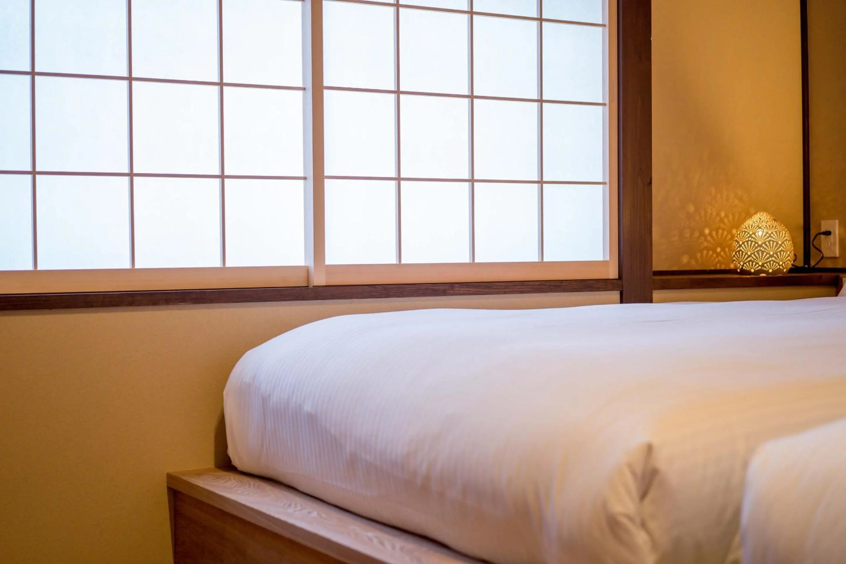 Bed in RESI STAY Villa Silktree