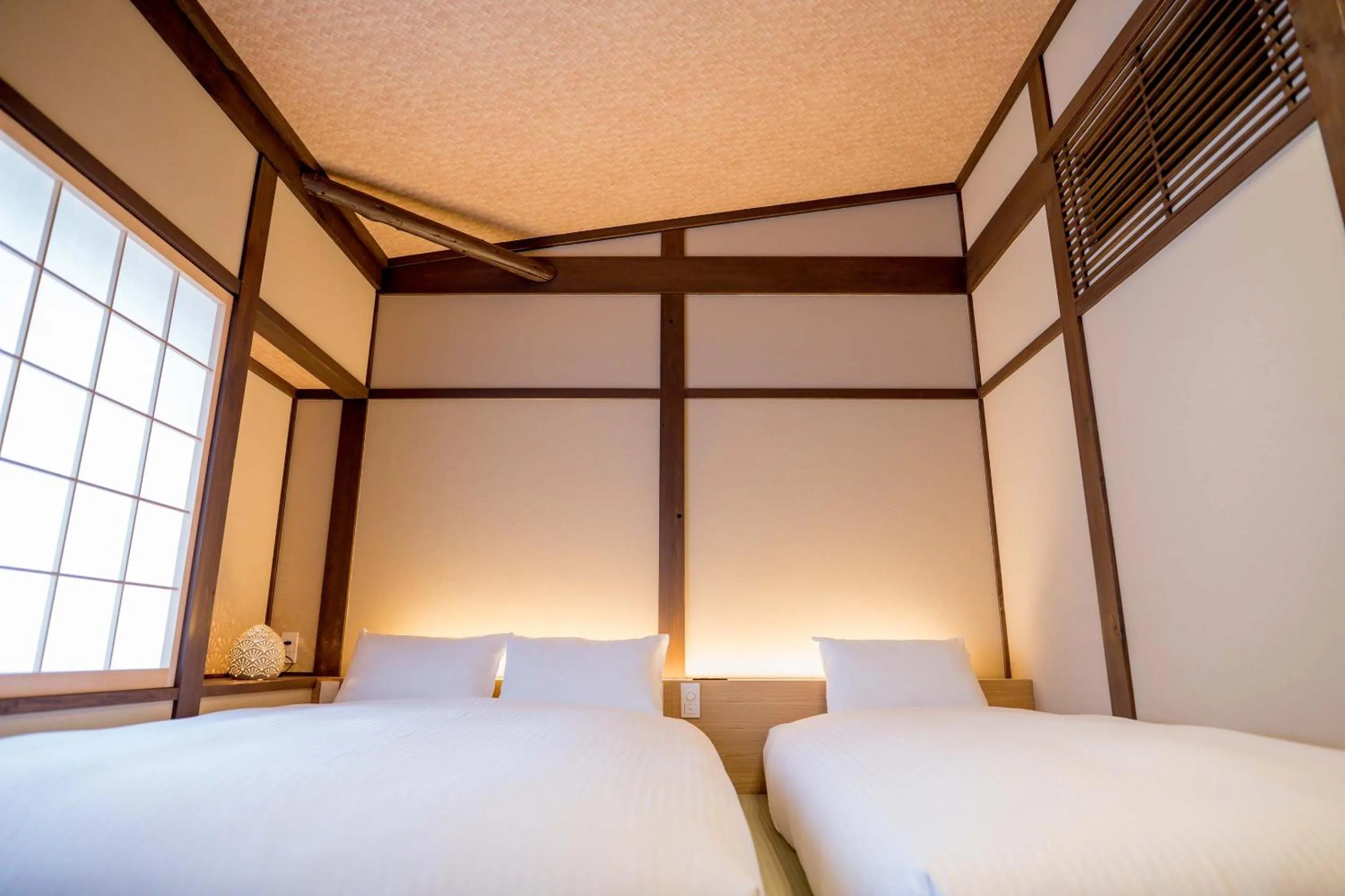 Bed in RESI STAY Villa Silktree