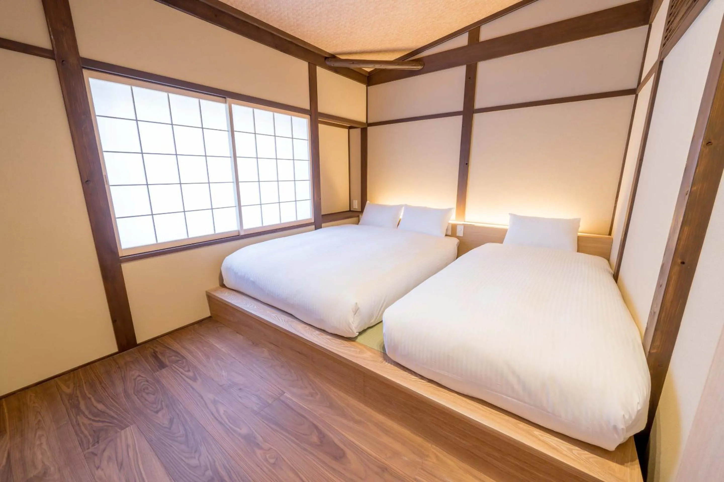 Bed in RESI STAY Villa Silktree