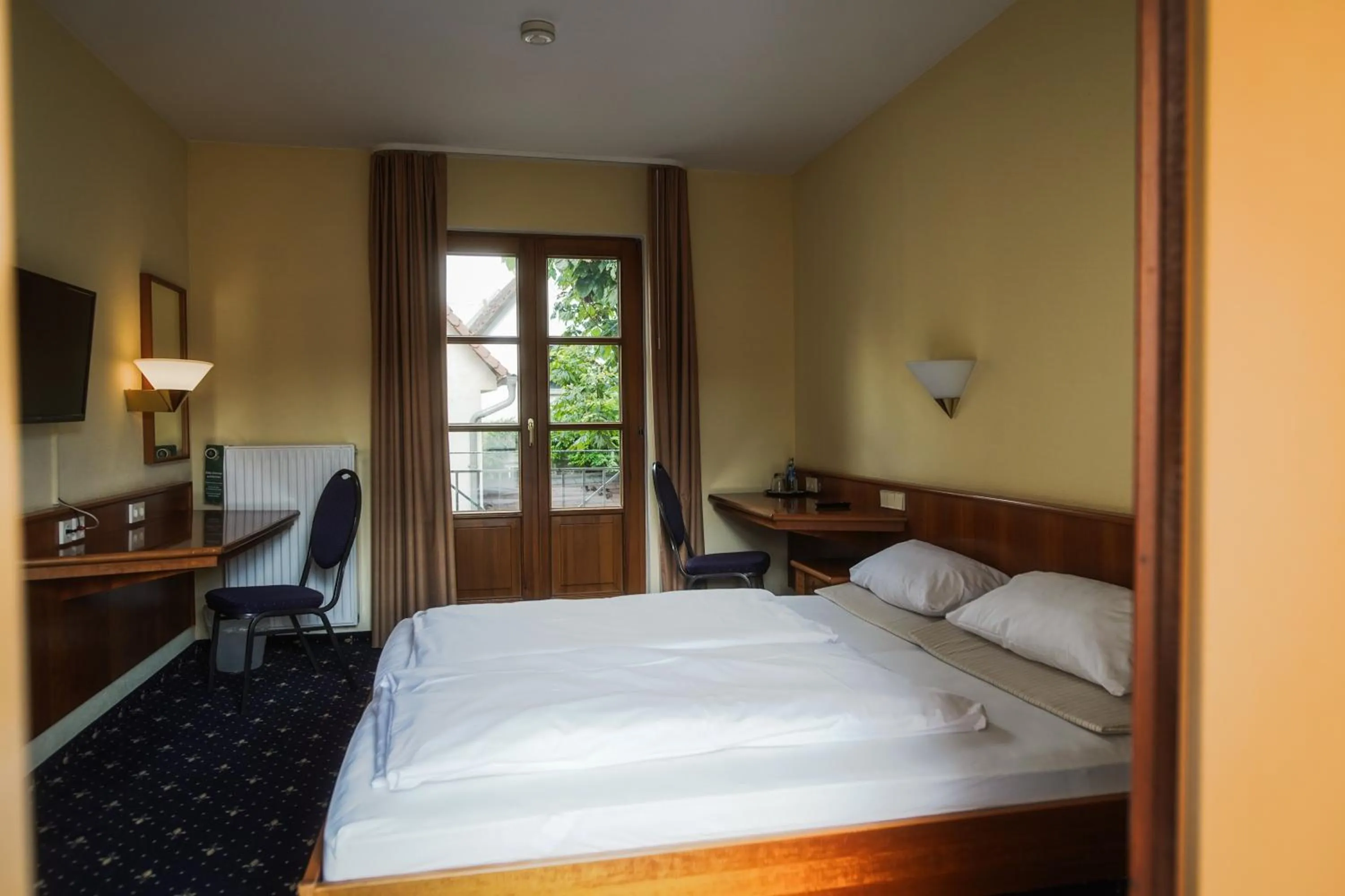 Bed in Hotel Erlenbacher Hof