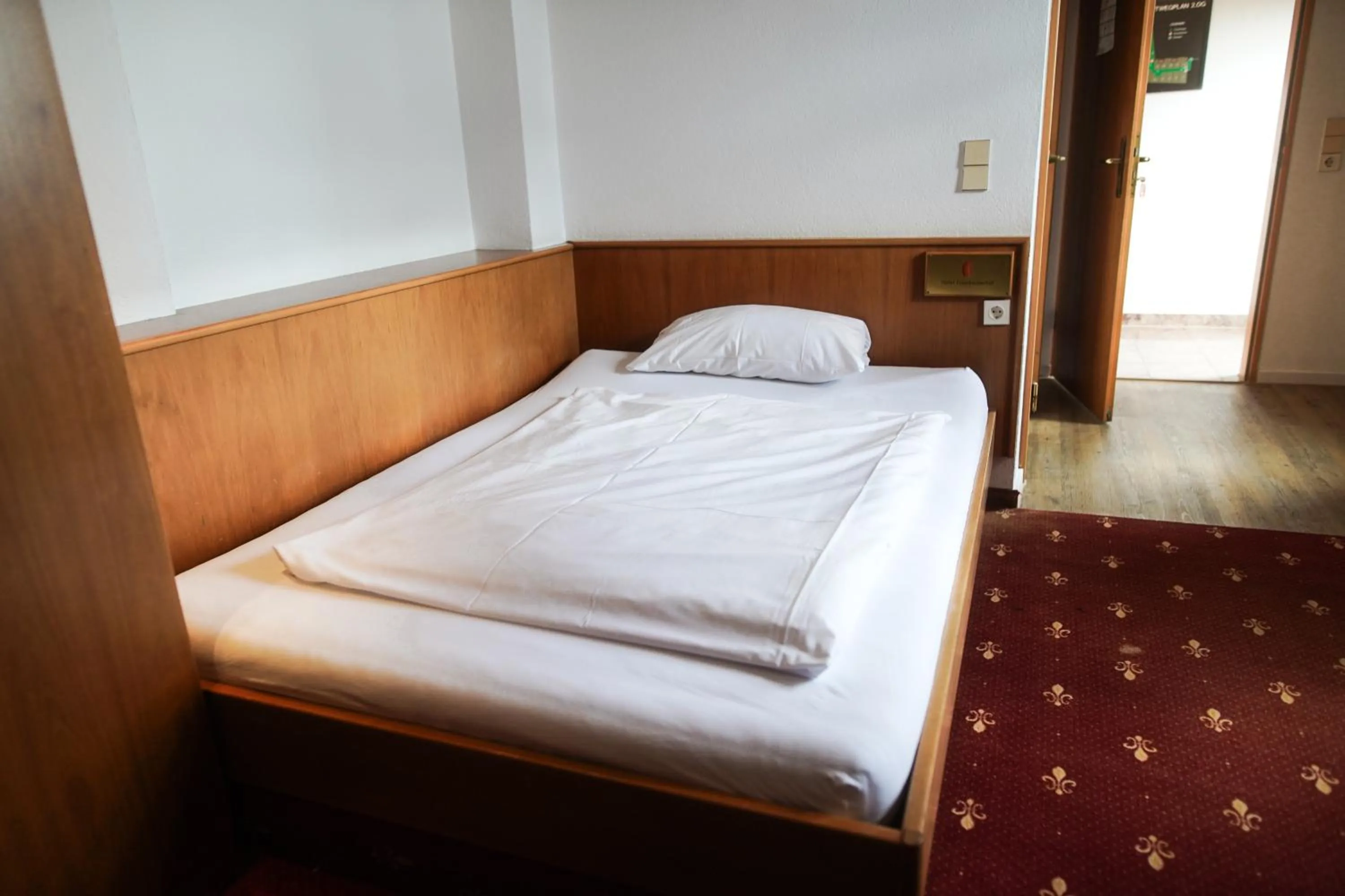 Bed in Hotel Erlenbacher Hof