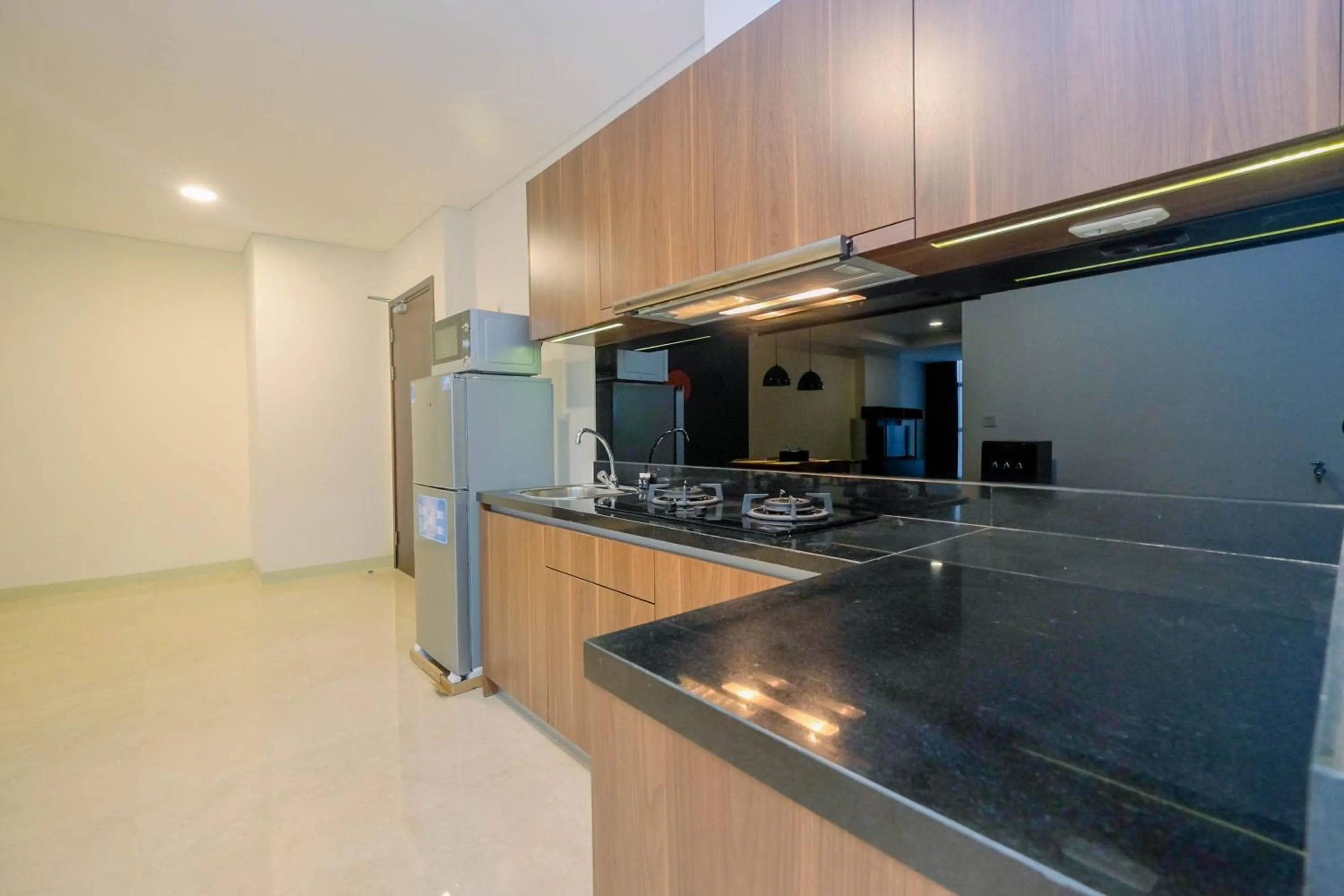 Modern and Spacious 2BR L'Avenue Apartment By Travelio