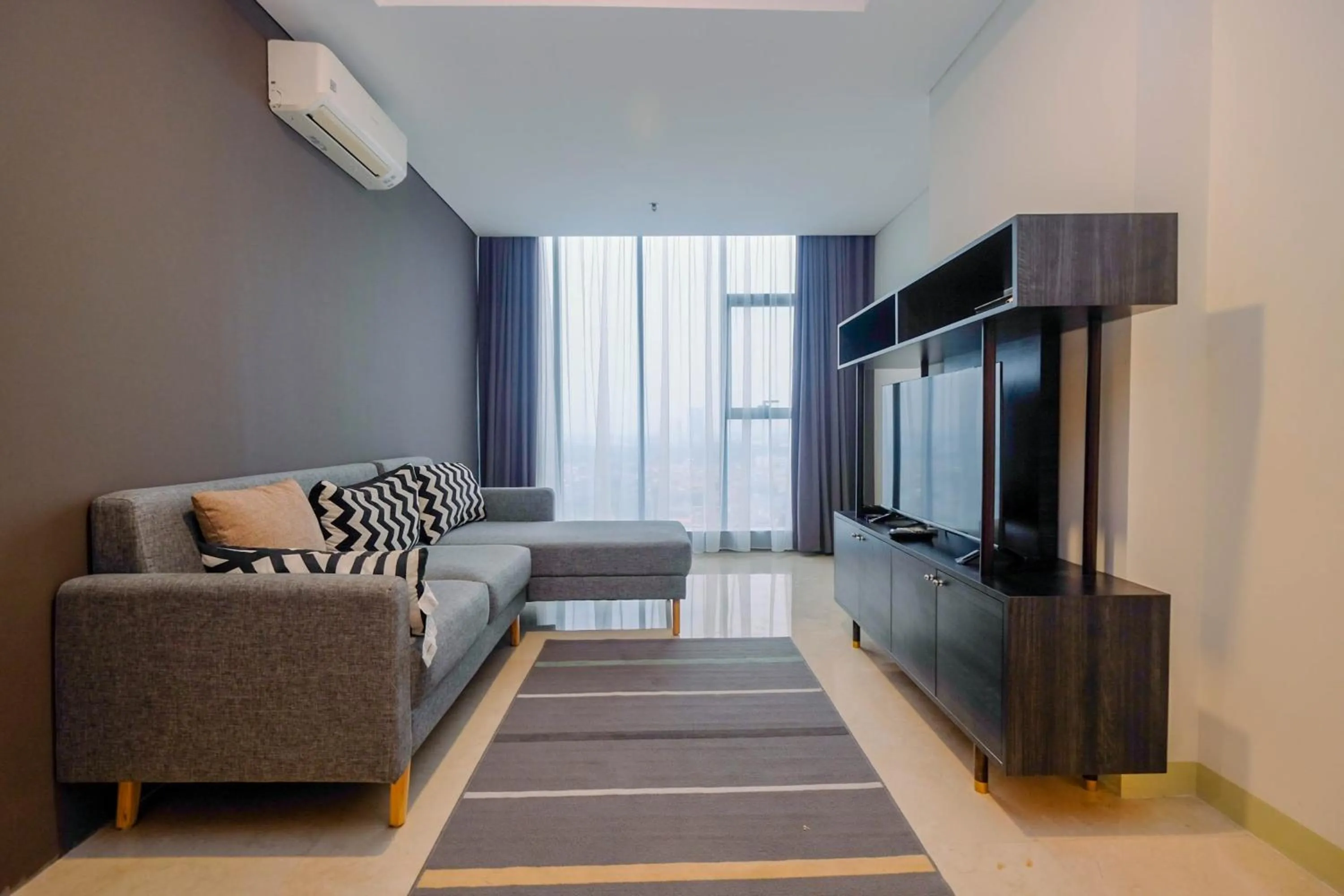 Modern and Spacious 2BR L'Avenue Apartment By Travelio