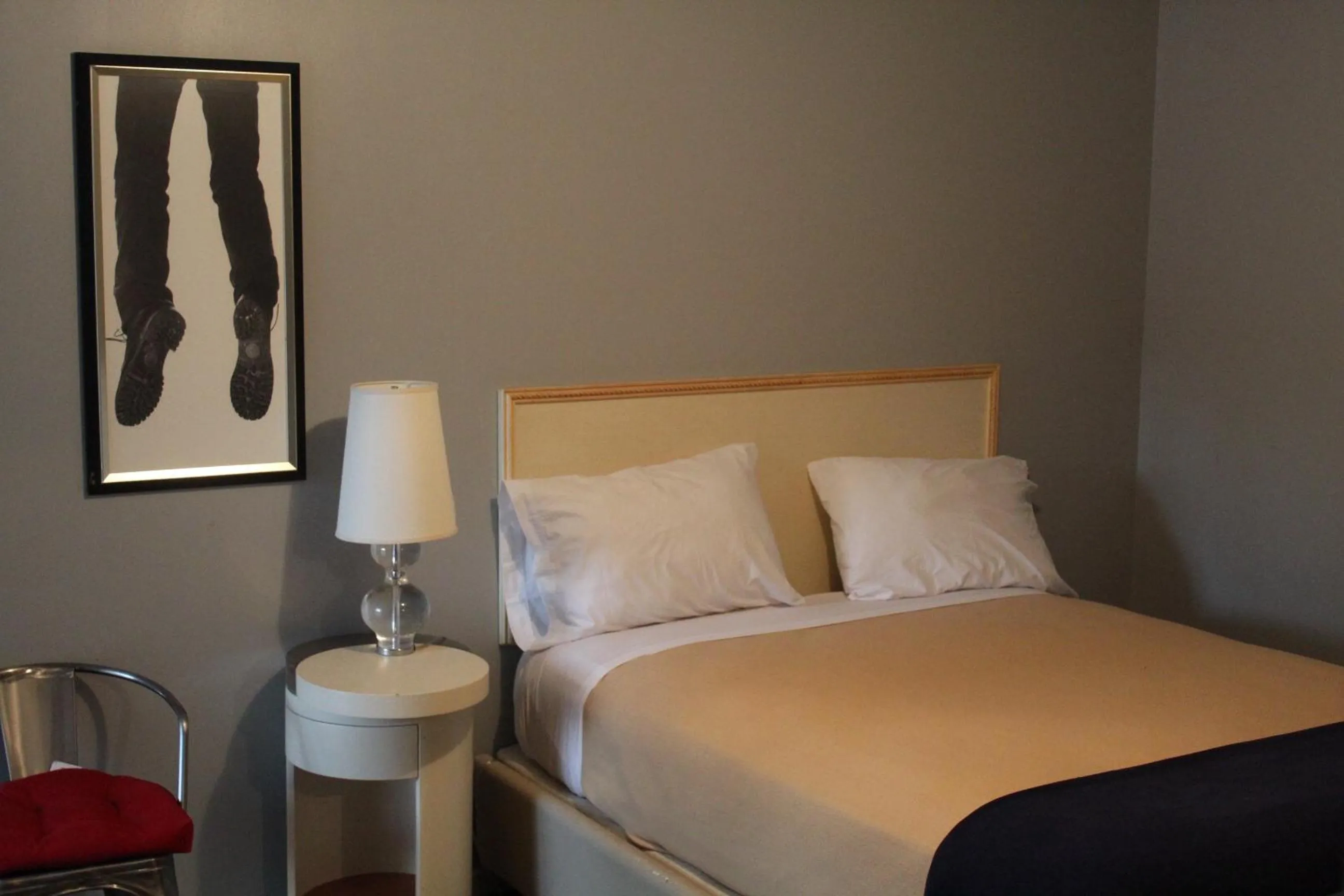 Bedroom in The Grand Motel