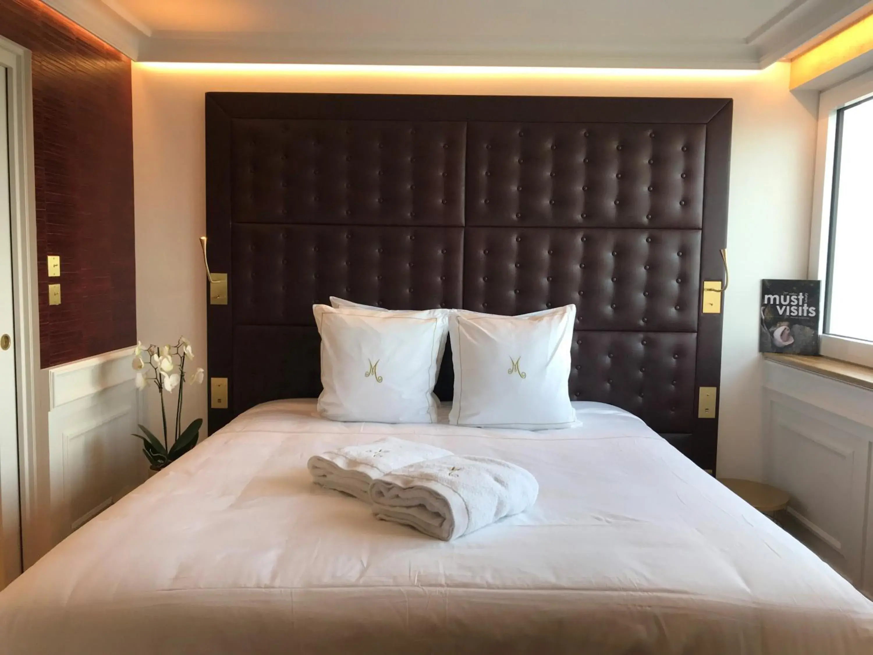 Bed in Hôtel Merveilleux Côté Mer Bed in Hôtel Merveilleux Côté Mer